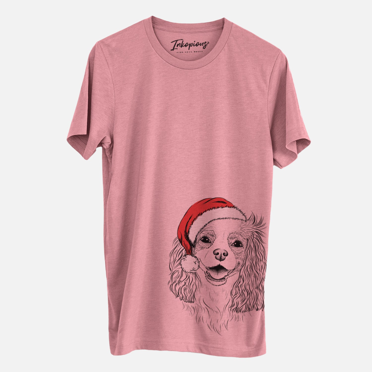 Hand-drawn sketch of Halley Comet the Cavalier King Charles Spaniel wearing a Santa hat on a Mauve Unisex crewneck, worn by a man