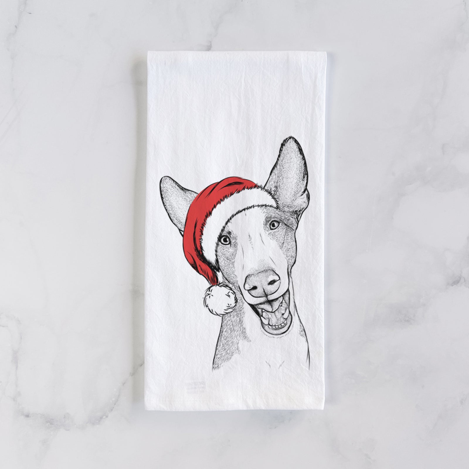 Hand-drawn sketch of Havok the Ibizan Hound wearing a Santa hat on a tea towel