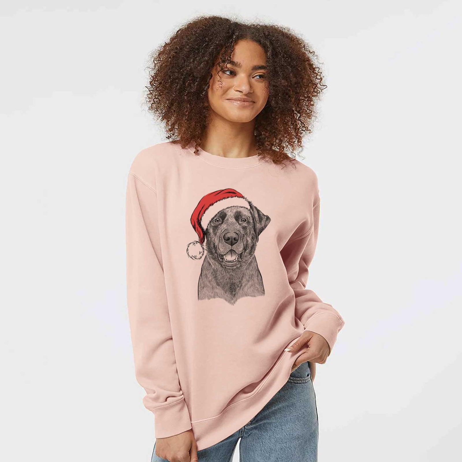 Hand-drawn sketch of Heath the Black Lab wearing a Santa hat on a Dusty Pink Unisex pigment dyed crew sweatshirt