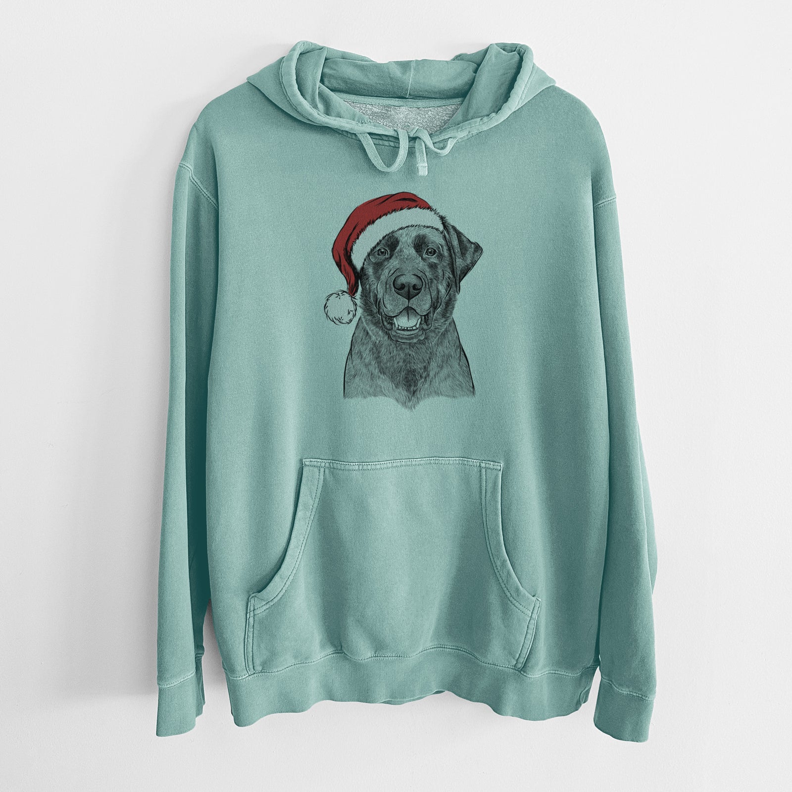 Hand-drawn sketch of Heath the Black Lab wearing a Santa hat on a Mint Unisex pigment dyed hoodie
