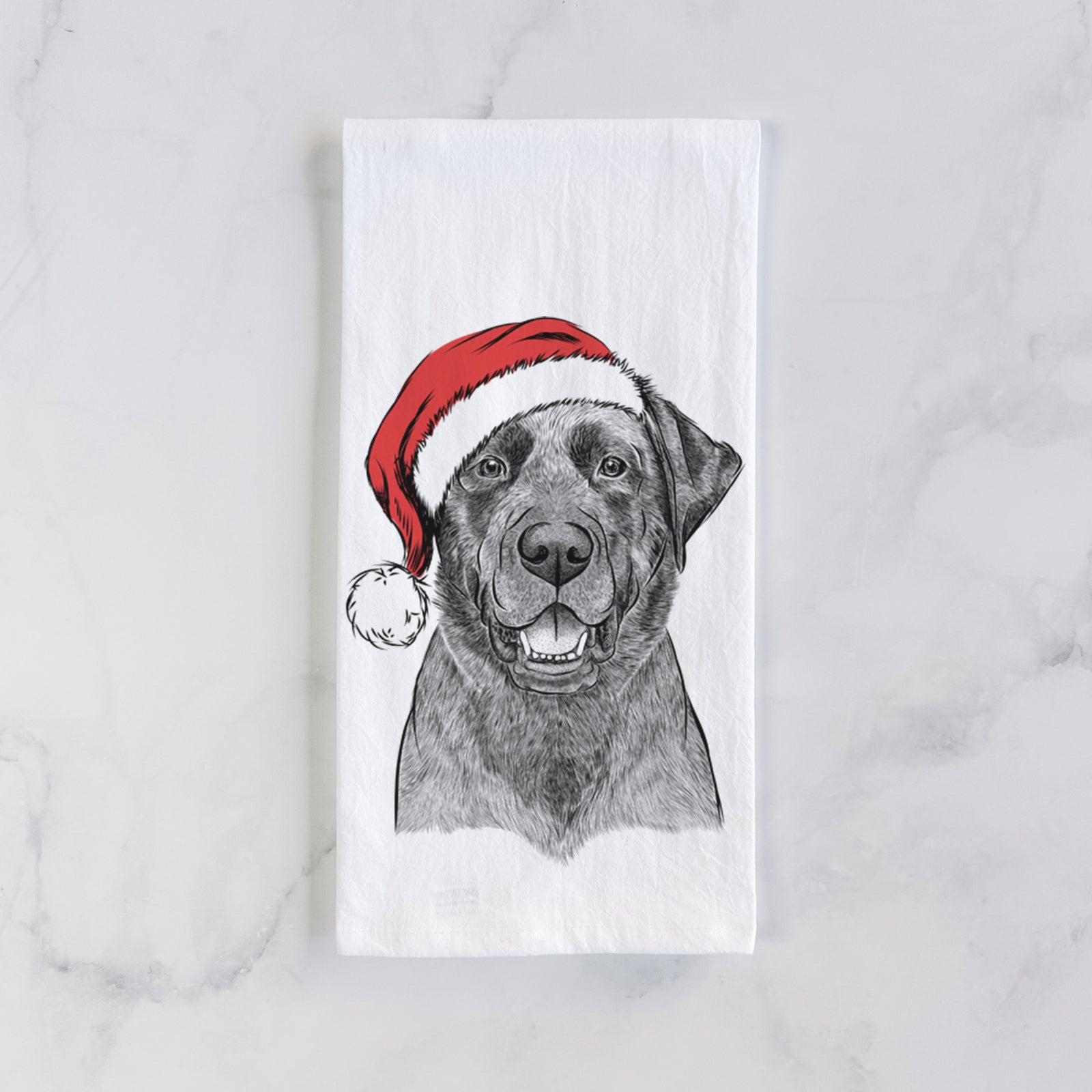 Hand-drawn sketch of Heath the Black Lab wearing a Santa hat on a tea towel