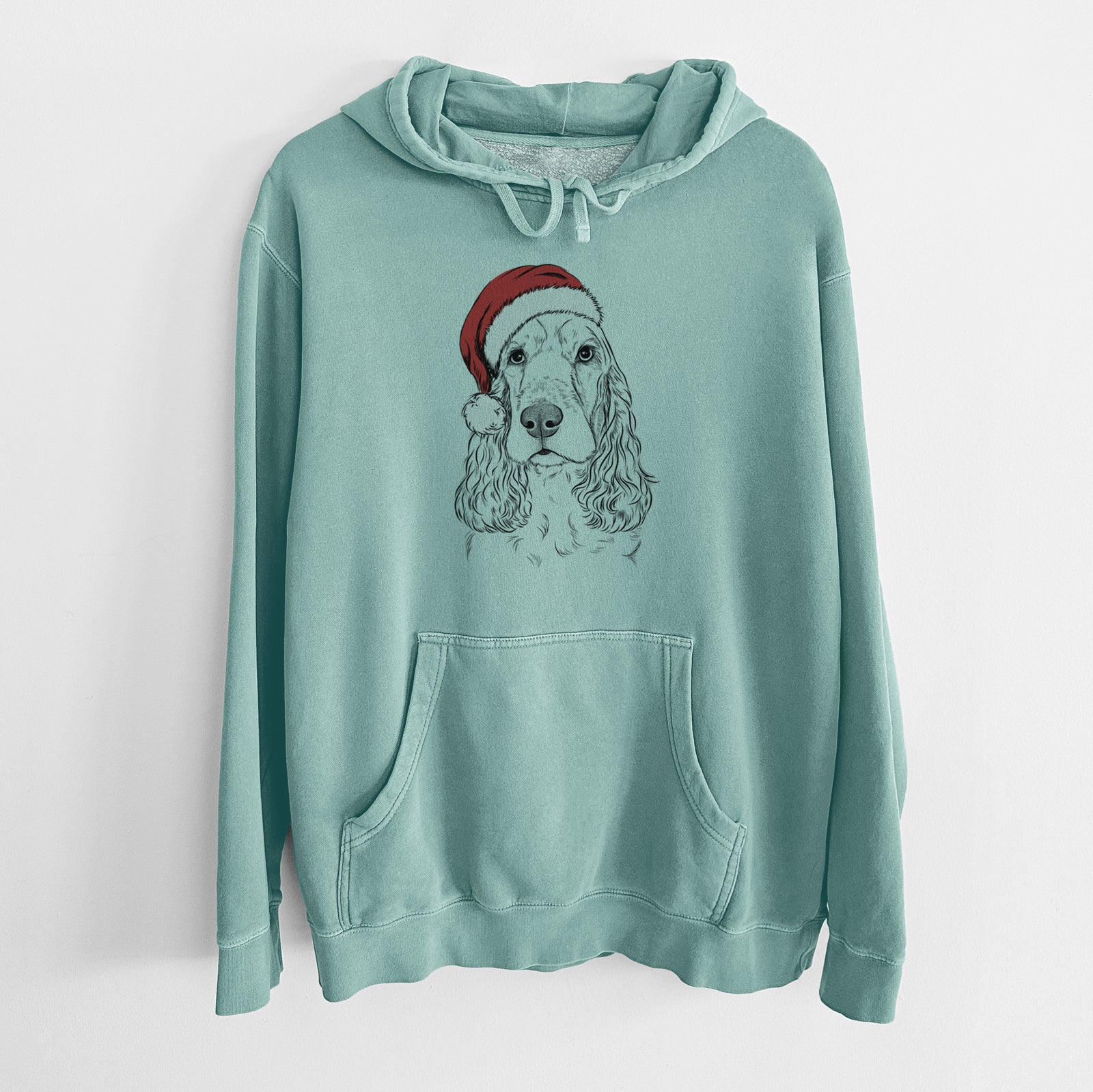 Hand-drawn sketch of Henry the English Cocker Spaniel wearing a Santa hat on a Mint Unisex pigment dyed hoodie