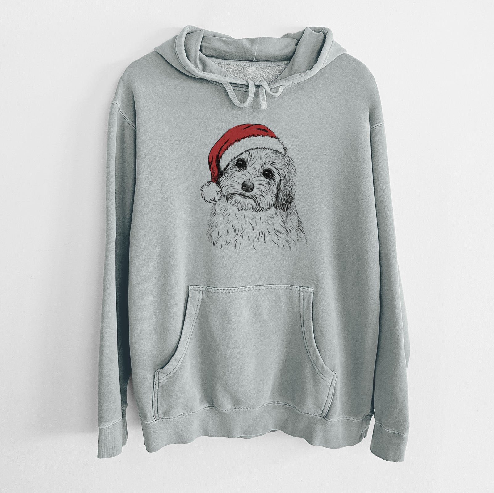 Hand-drawn sketch of Henry the Havanese wearing a Santa hat on a Sage Unisex pigment dyed hoodie