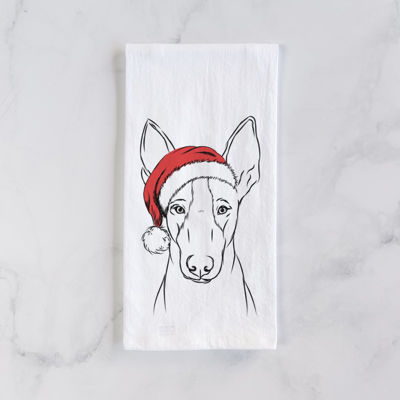 Hand-drawn sketch of Indy the Ibizan Hound wearing a Santa hat on a tea towel