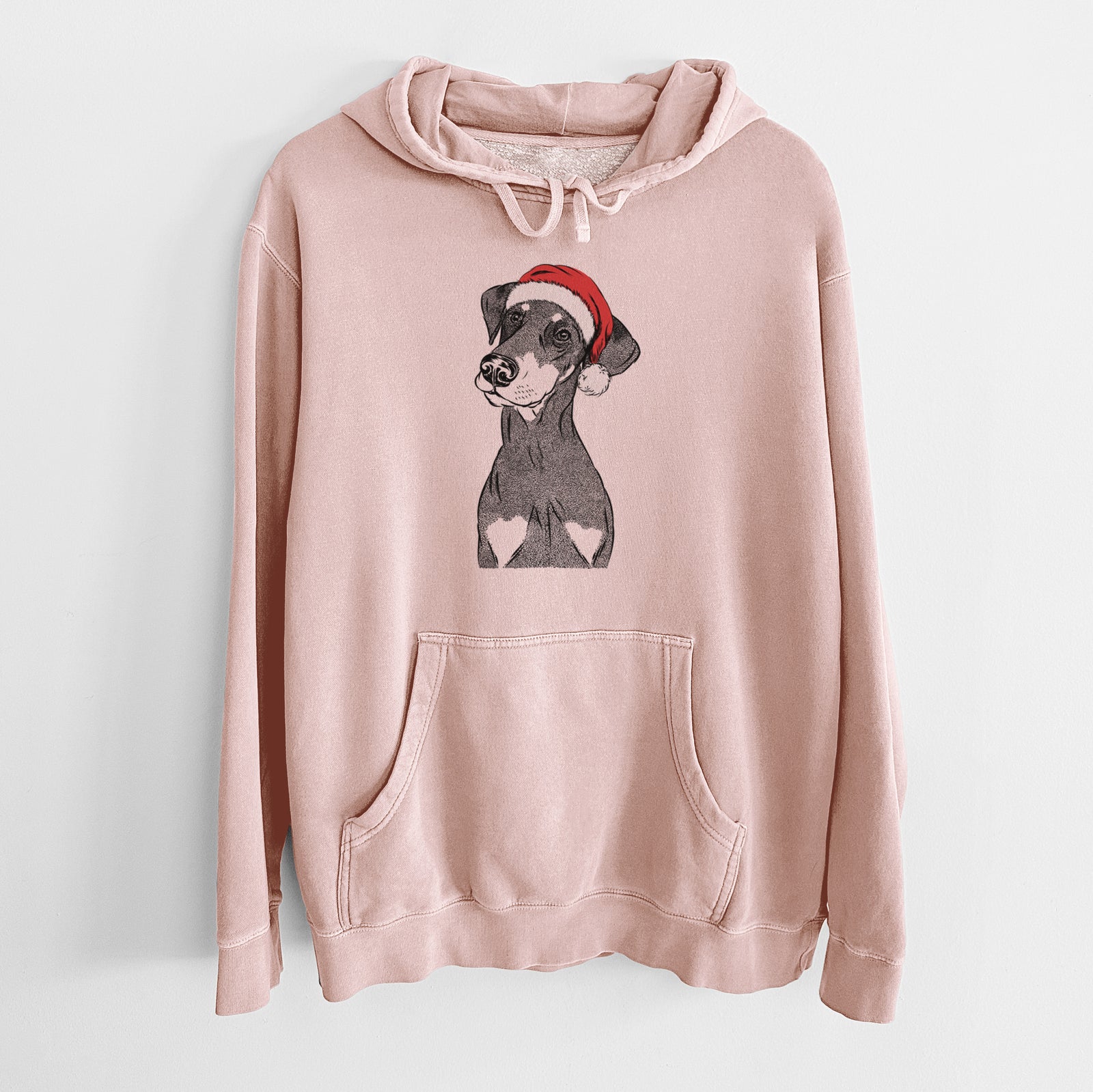 Hand-drawn sketch of Iroh the Doberman Pinscher wearing a Santa hat on a Dusty Pink Unisex pigment dyed hoodie