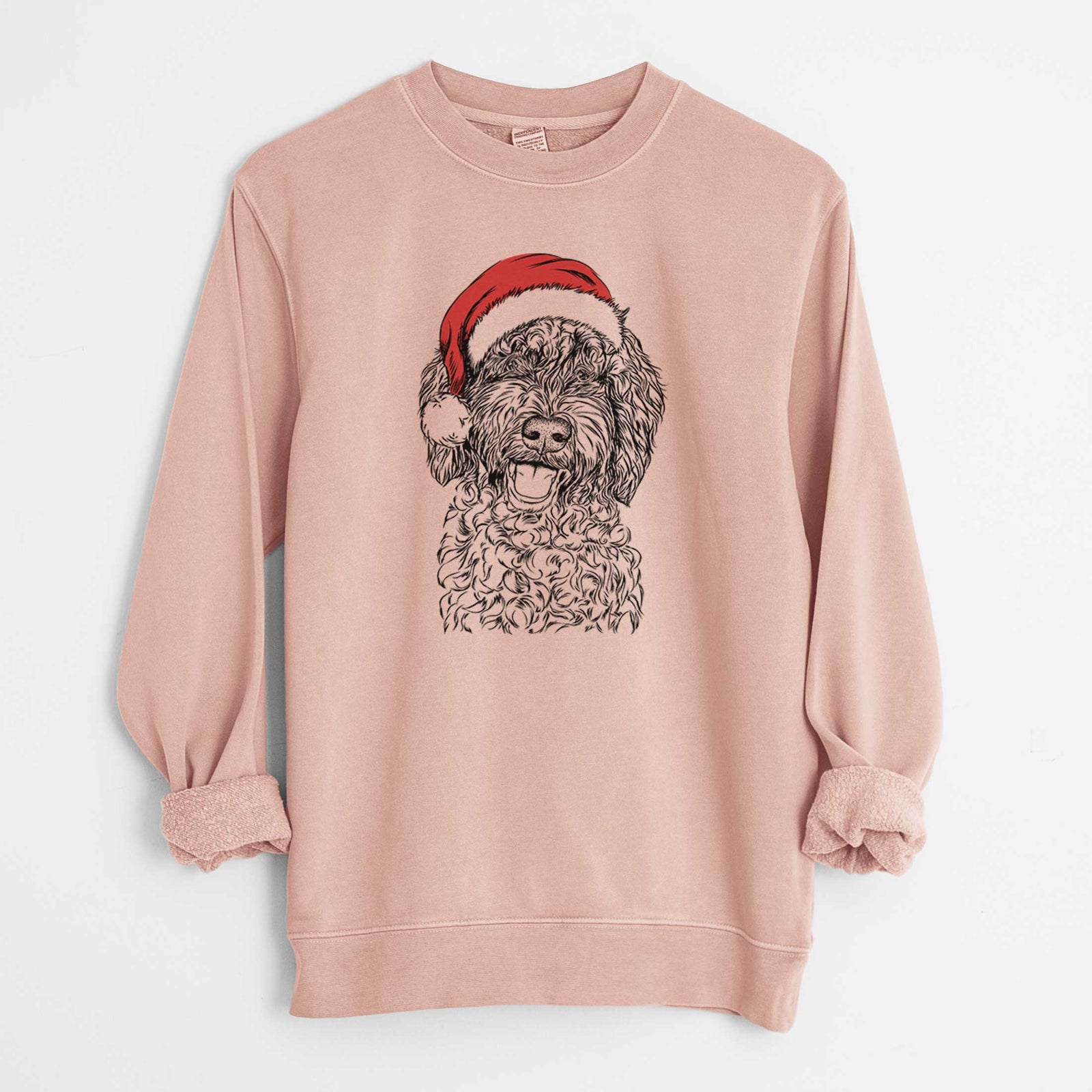 Hand-drawn sketch of Jack the Chocolate Labradoodle wearing a Santa hat on a Dusty Pink Unisex pigment dyed crew sweatshirt