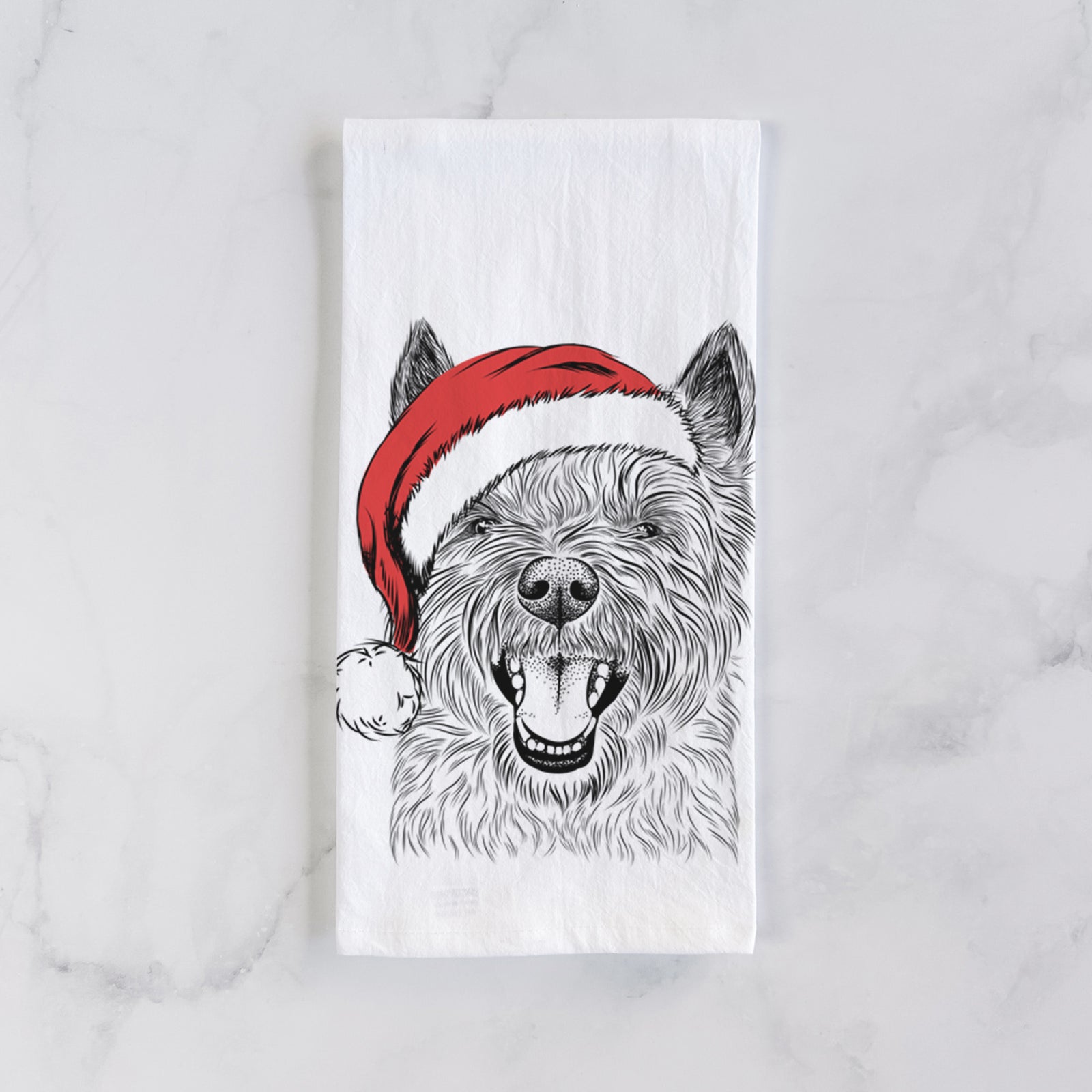 Hand-drawn sketch of Jeff the Cairn Terrier wearing a Santa hat on a tea towel