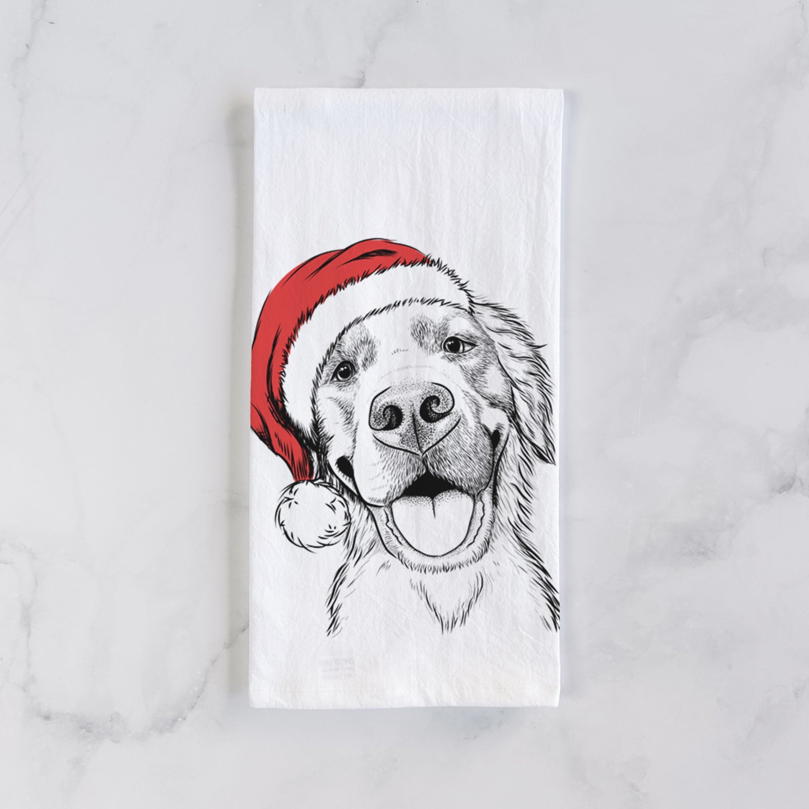 Hand-drawn sketch of Jordy the Golden Retriever wearing a Santa hat on a tea towel