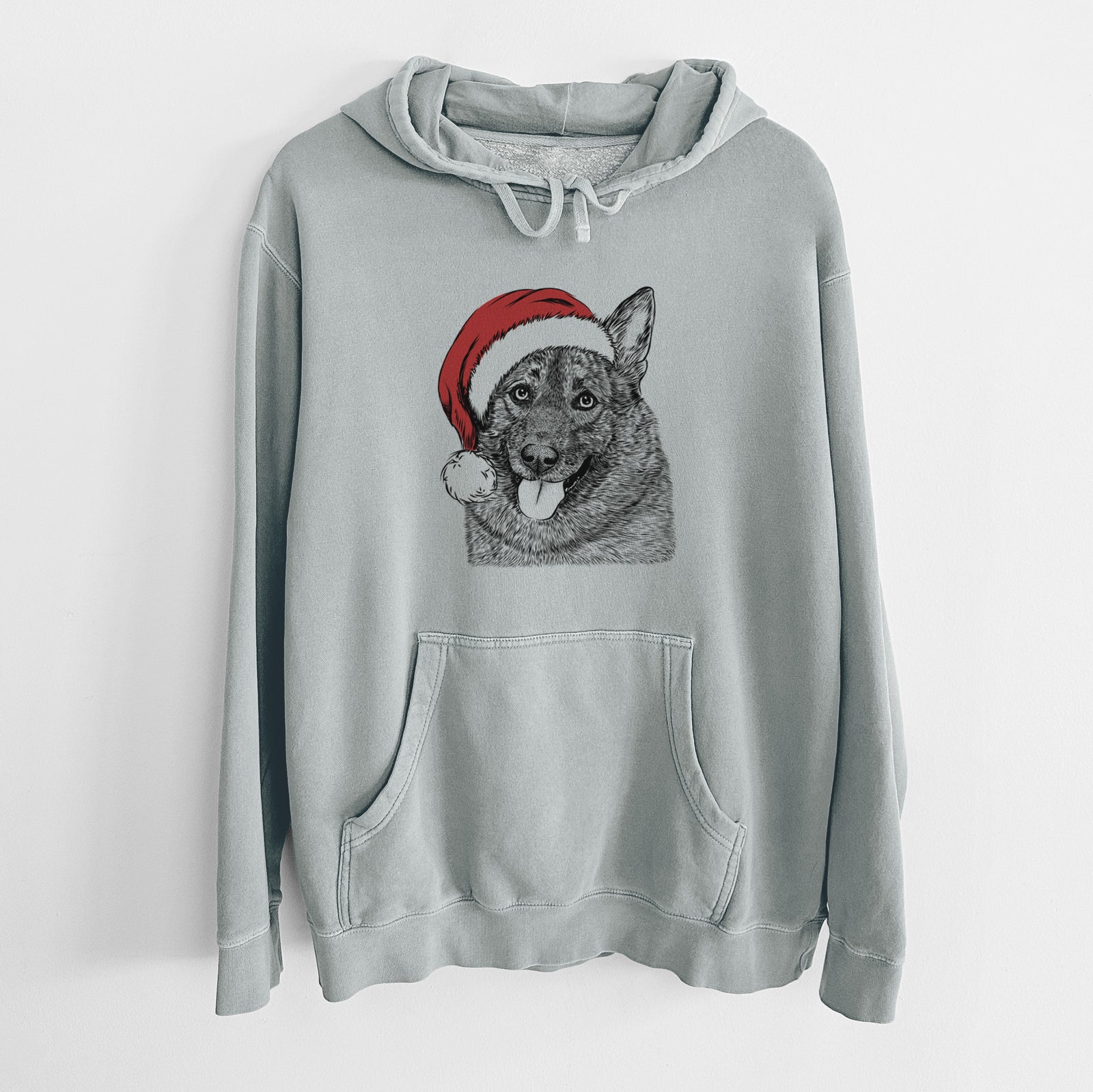 Hand-drawn sketch of Kasia the Norwegian Elkhound wearing a Santa hat on a Sage Unisex pigment dyed hoodie