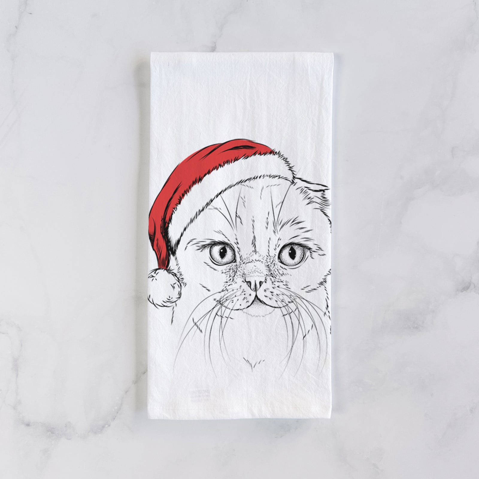 Hand-drawn sketch of Lina the Exotic Fold Cat wearing a Santa hat on a tea towel