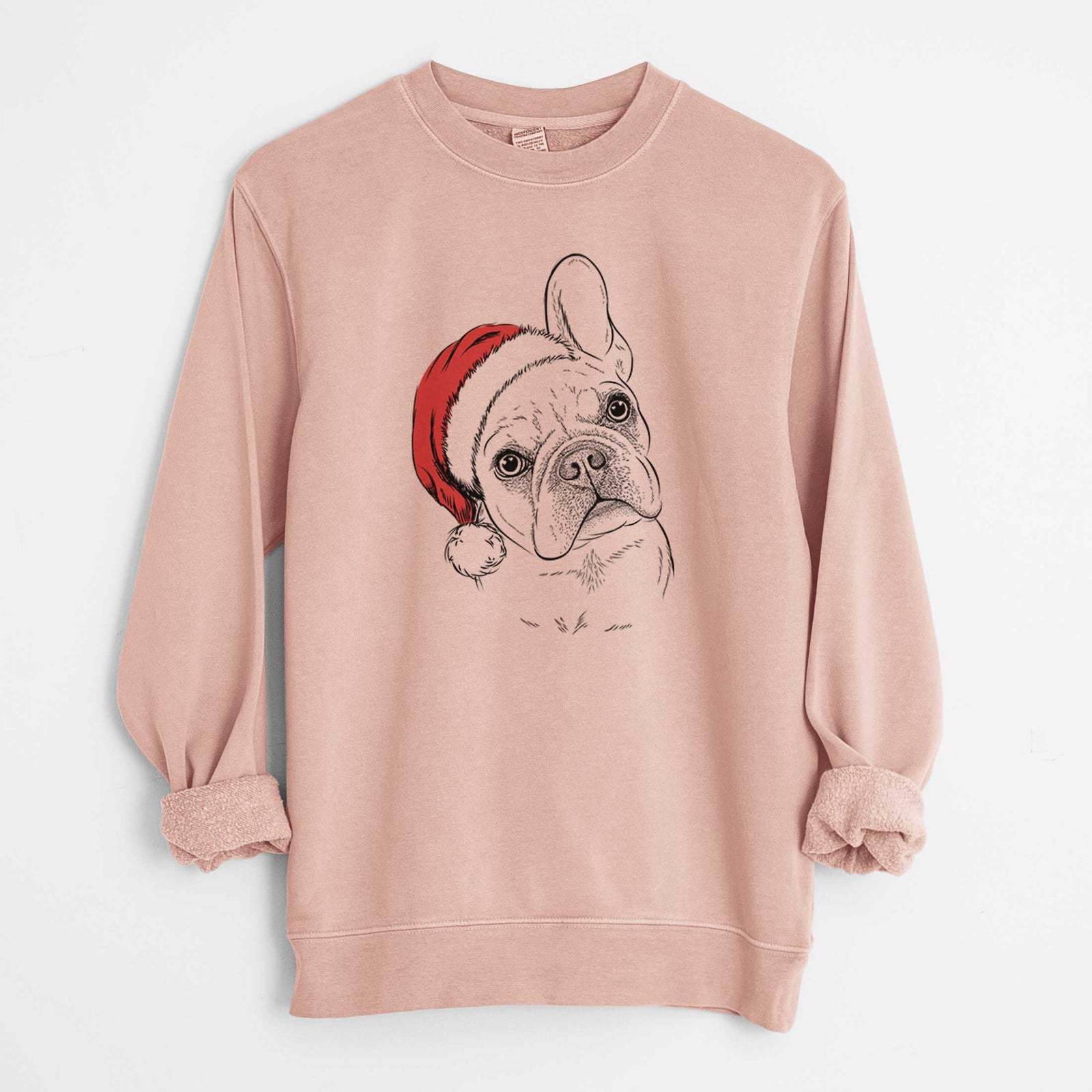 Hand-drawn sketch of Loki the French Bulldog wearing a Santa hat on a Dusty Pink Unisex pigment dyed crew sweatshirt