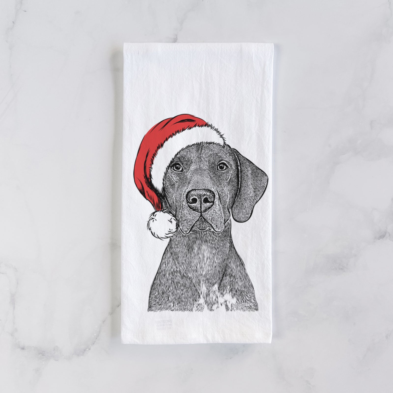Hand-drawn sketch of Lucifer the German Shorthaired Pointer wearing a Santa hat on a tea towel
