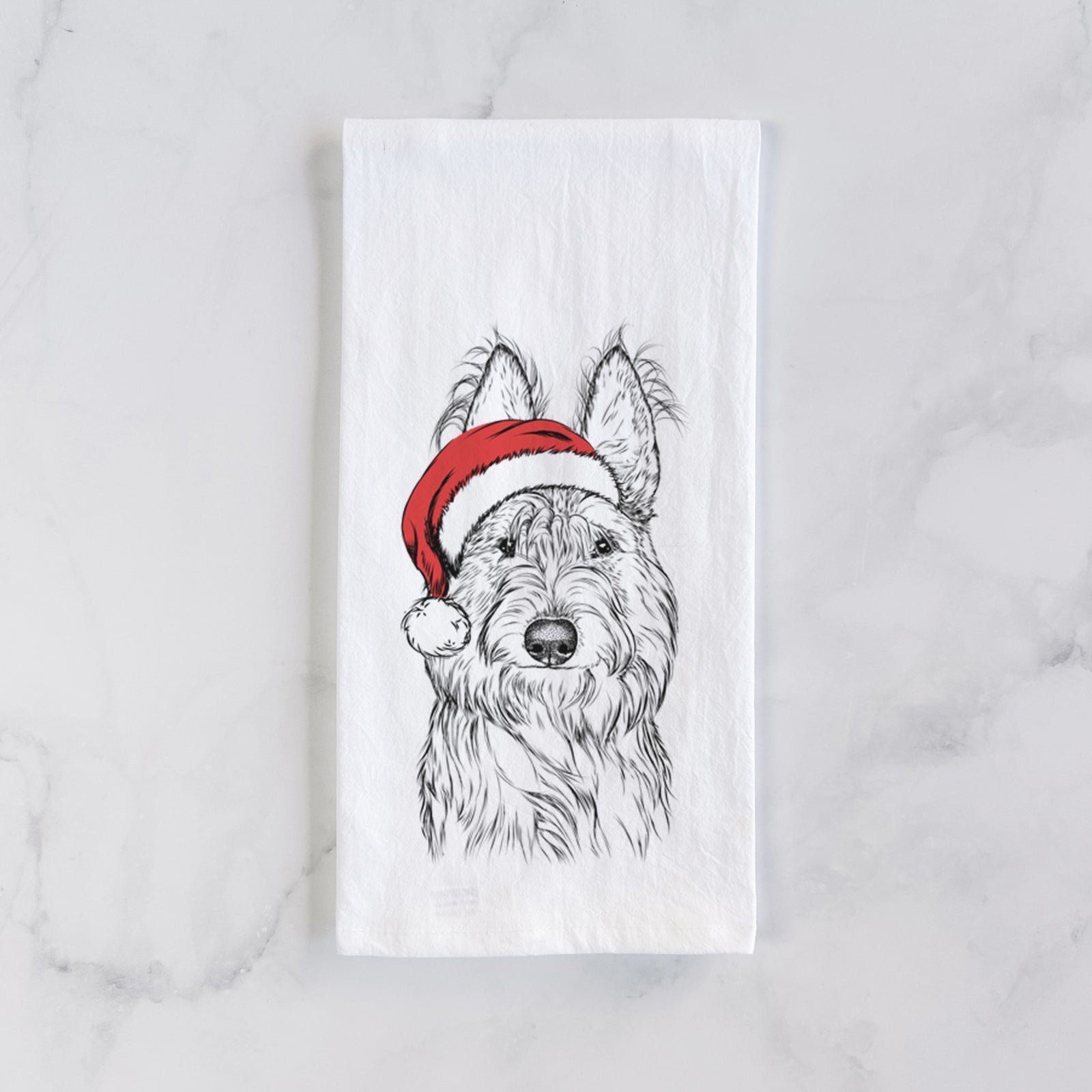 Hand-drawn sketch of Luna the Berger Picard wearing a Santa hat on a tea towel