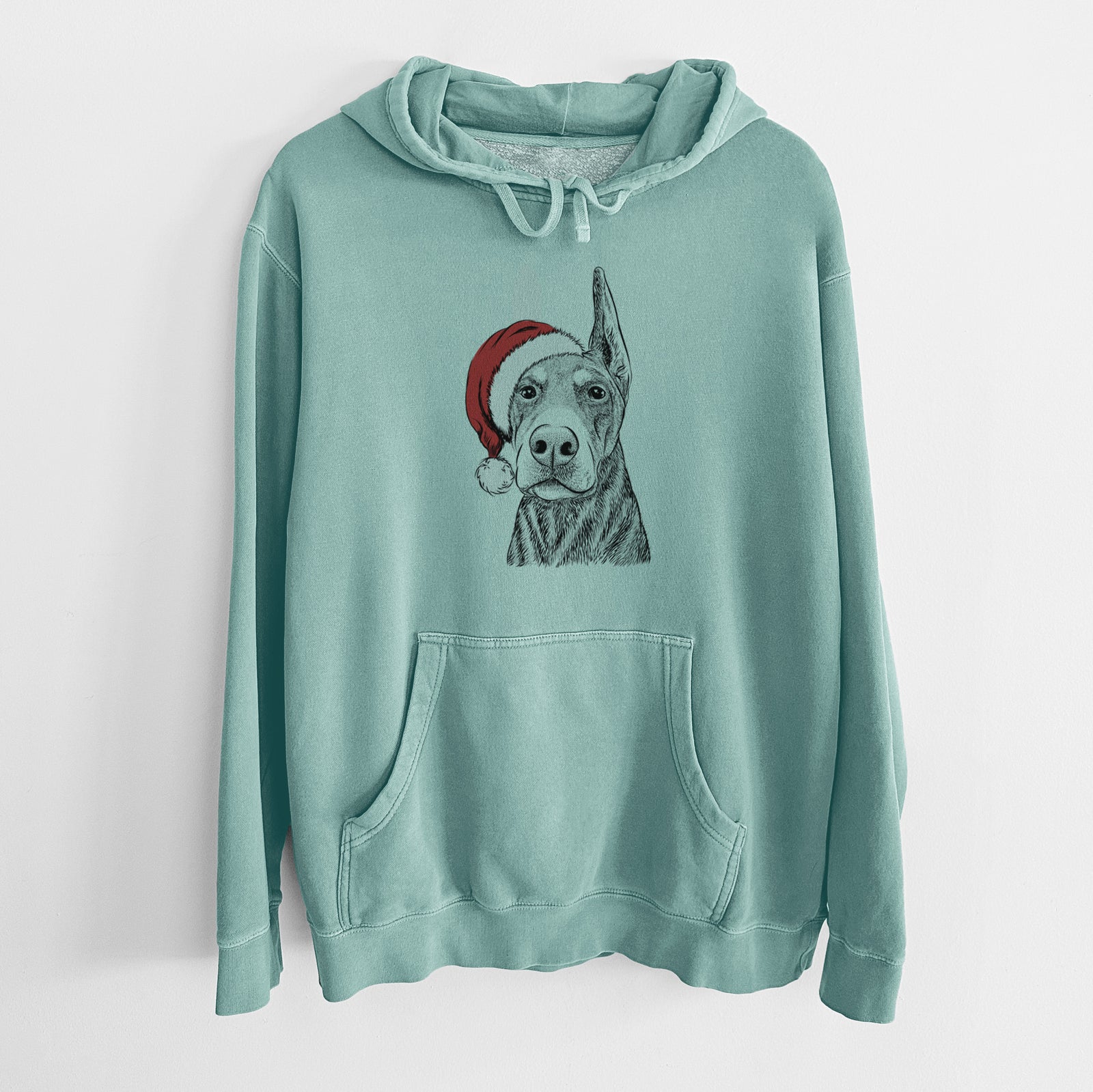 Hand-drawn sketch of Luna the Doberman Pinscher wearing a Santa hat on a Mint Unisex pigment dyed hoodie