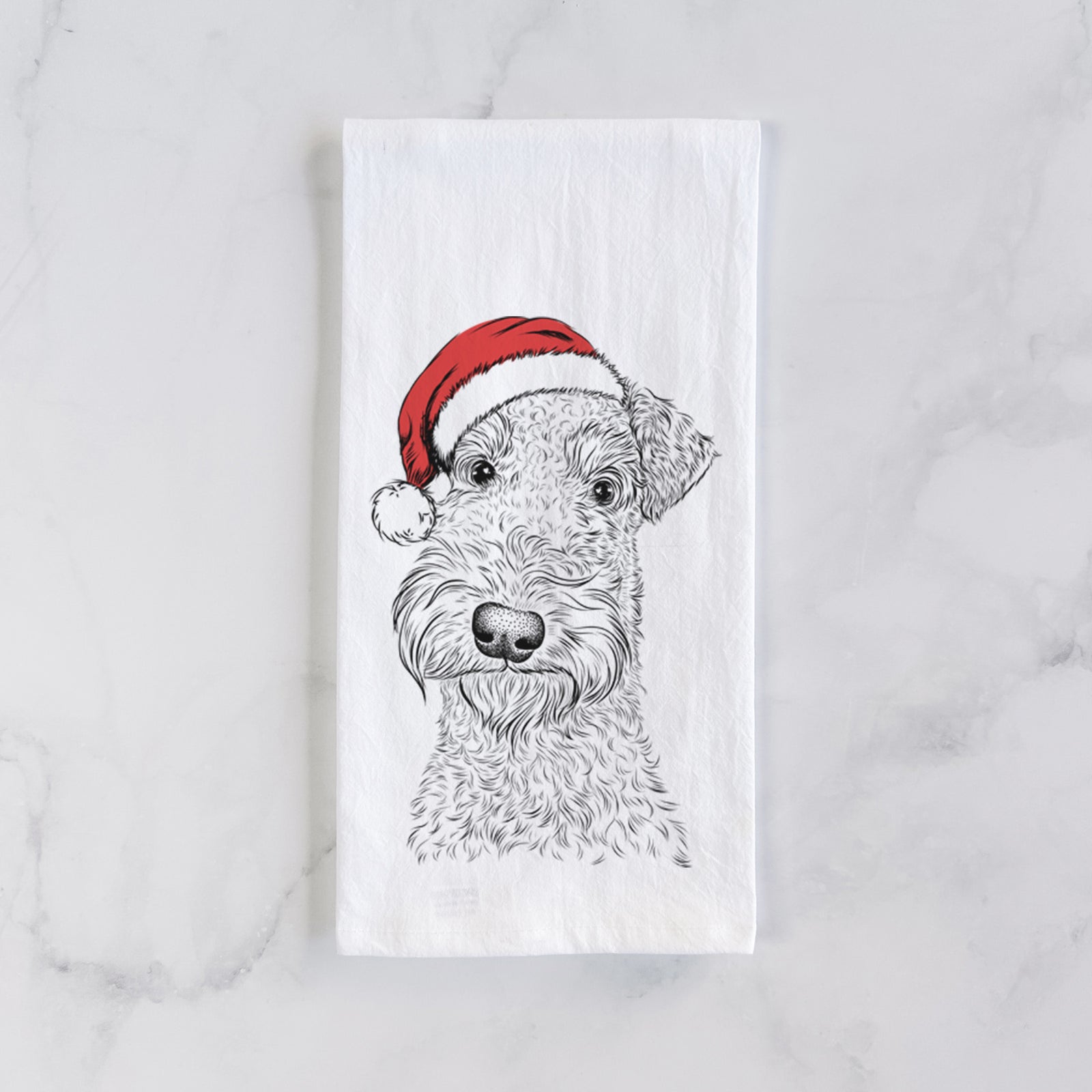 Hand-drawn sketch of Roc Haven Maggie May the Airedale Terrier wearing a Santa hat on a tea towel
