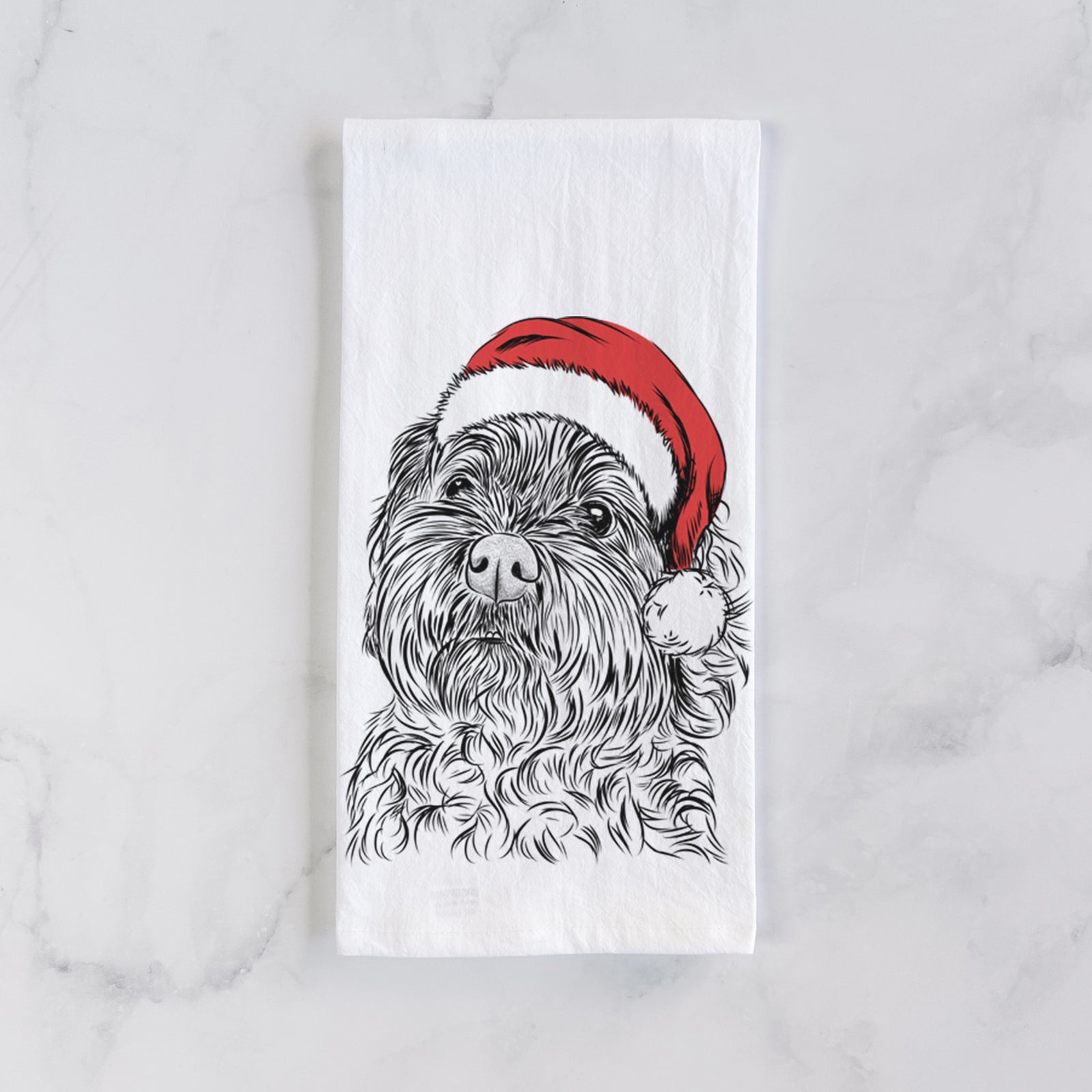 Hand-drawn sketch of Maggie Girl the Cockapoo wearing a Santa hat on a tea towel