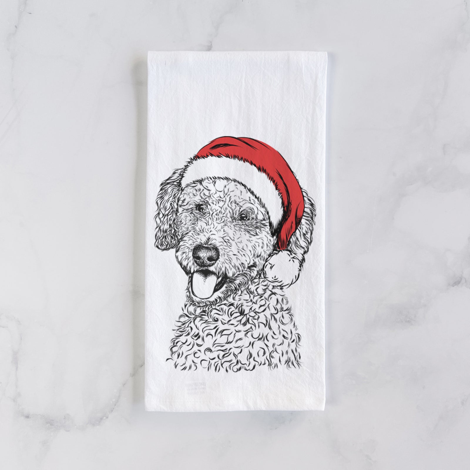 Hand-drawn sketch of Marlow the Goldendoodle wearing a Santa hat on a tea towel