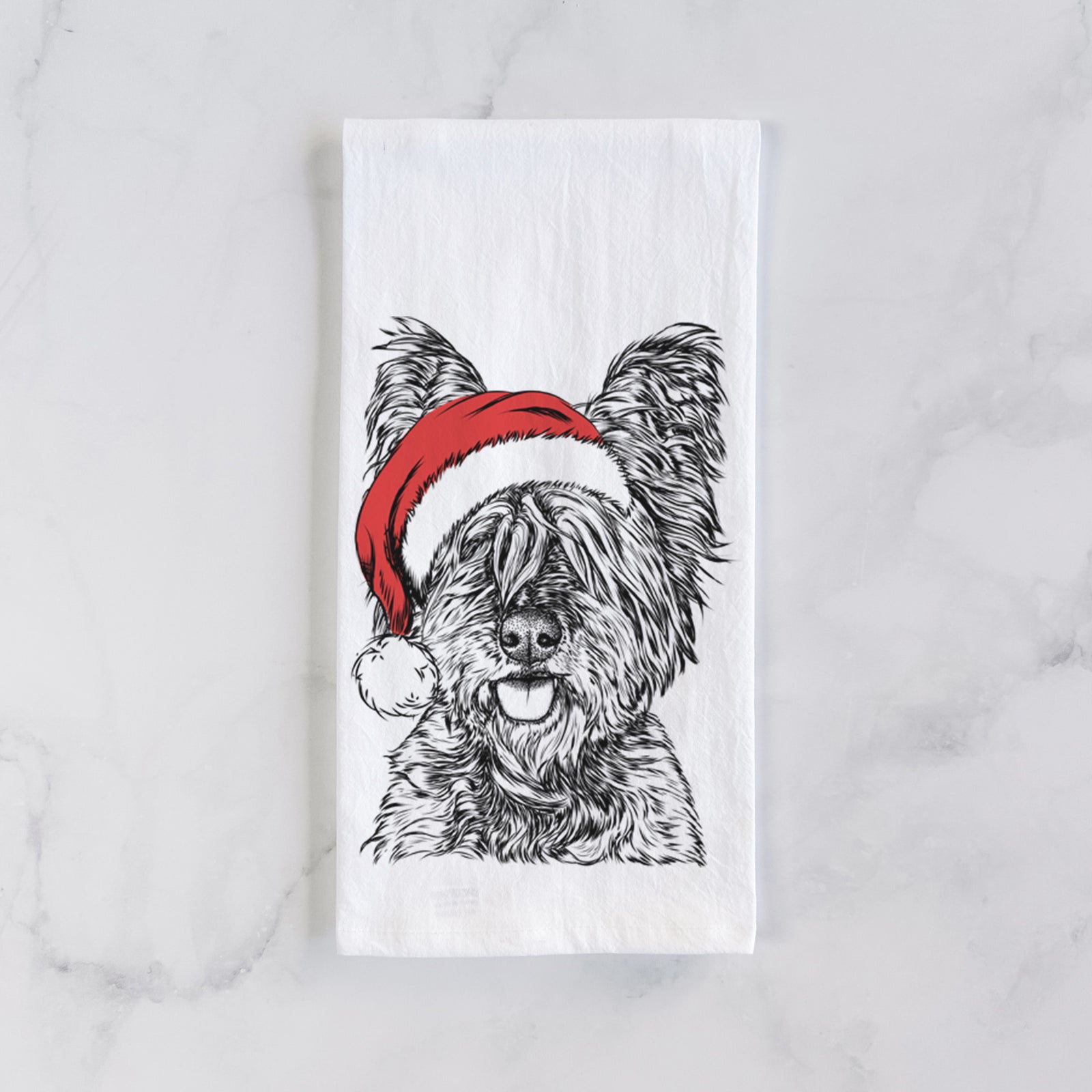 Hand-drawn sketch of McDuff the Cairn Terrier wearing a Santa hat on a tea towel