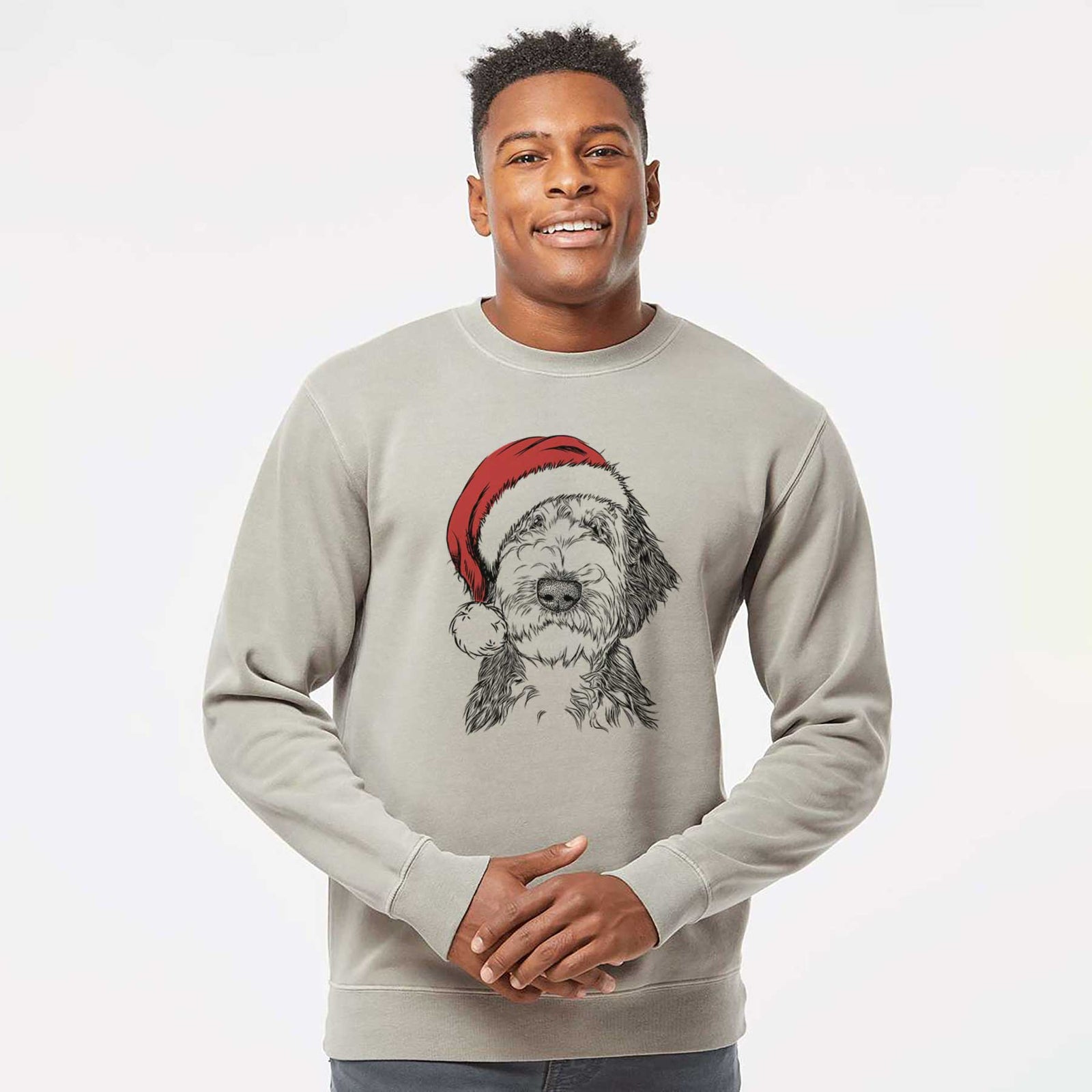 Hand-drawn sketch of Milo Fluff the Sheepadoodle wearing a Santa hat on a Cement Unisex pigment dyed crew sweatshirt
