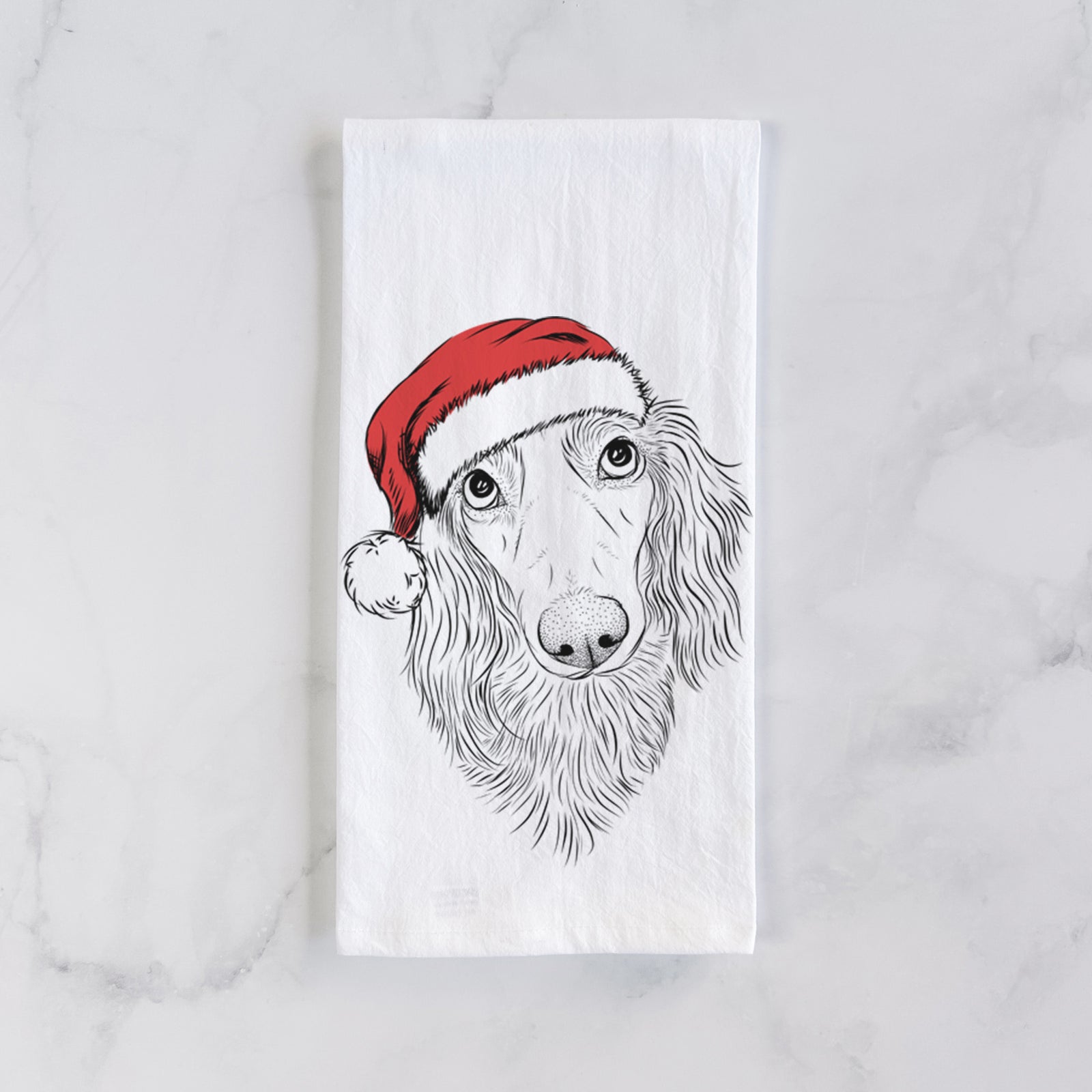 Hand-drawn sketch of Mr. Rusty the Long Haired Dachshund wearing a Santa hat on a tea towel