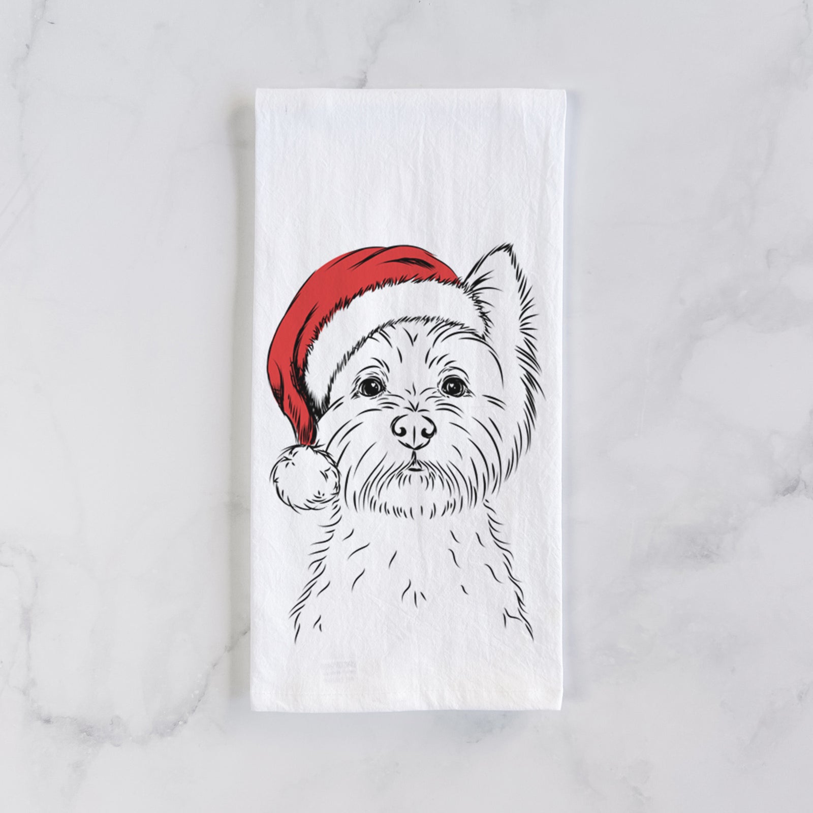 Hand-drawn sketch of Murphy the West Highland Terrier wearing a Santa hat on a tea towel