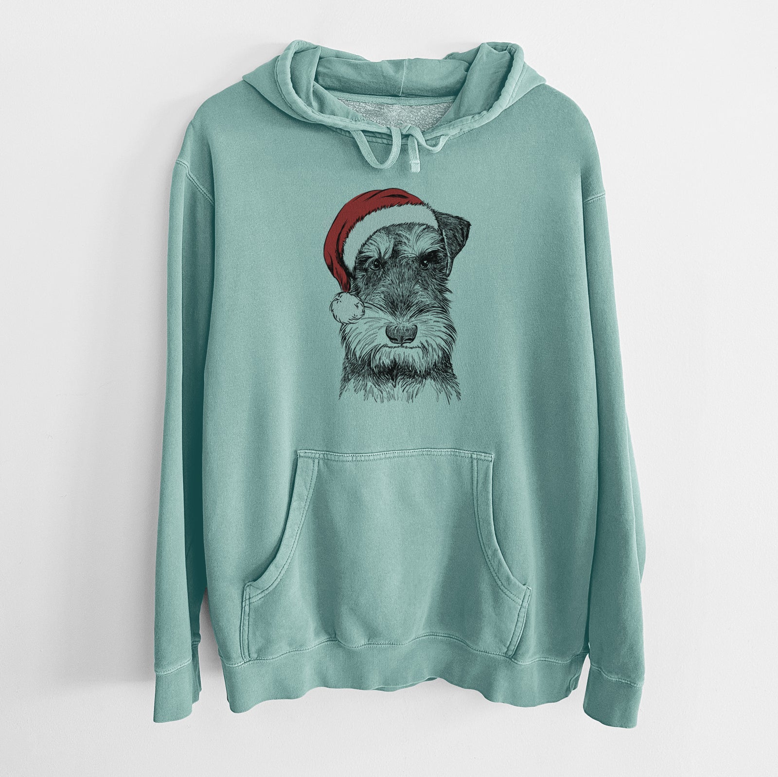 Hand-drawn sketch of Murphy the Mini Schnauzer wearing a Santa hat on a Mint Unisex pigment dyed hoodie