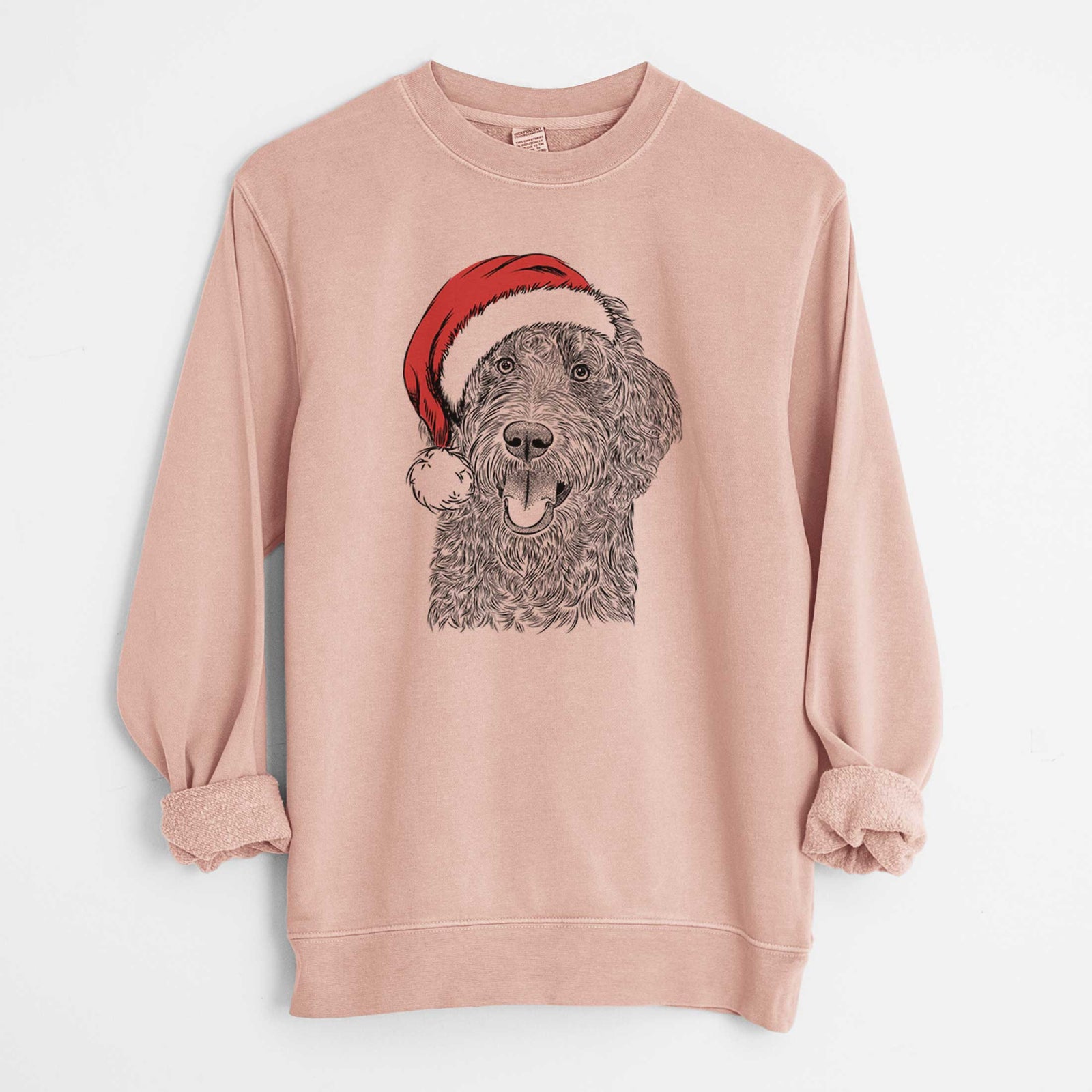 Hand-drawn sketch of Murr Dog the Labradoodle wearing a Santa hat on a Dusty Pink Unisex pigment dyed crew sweatshirt