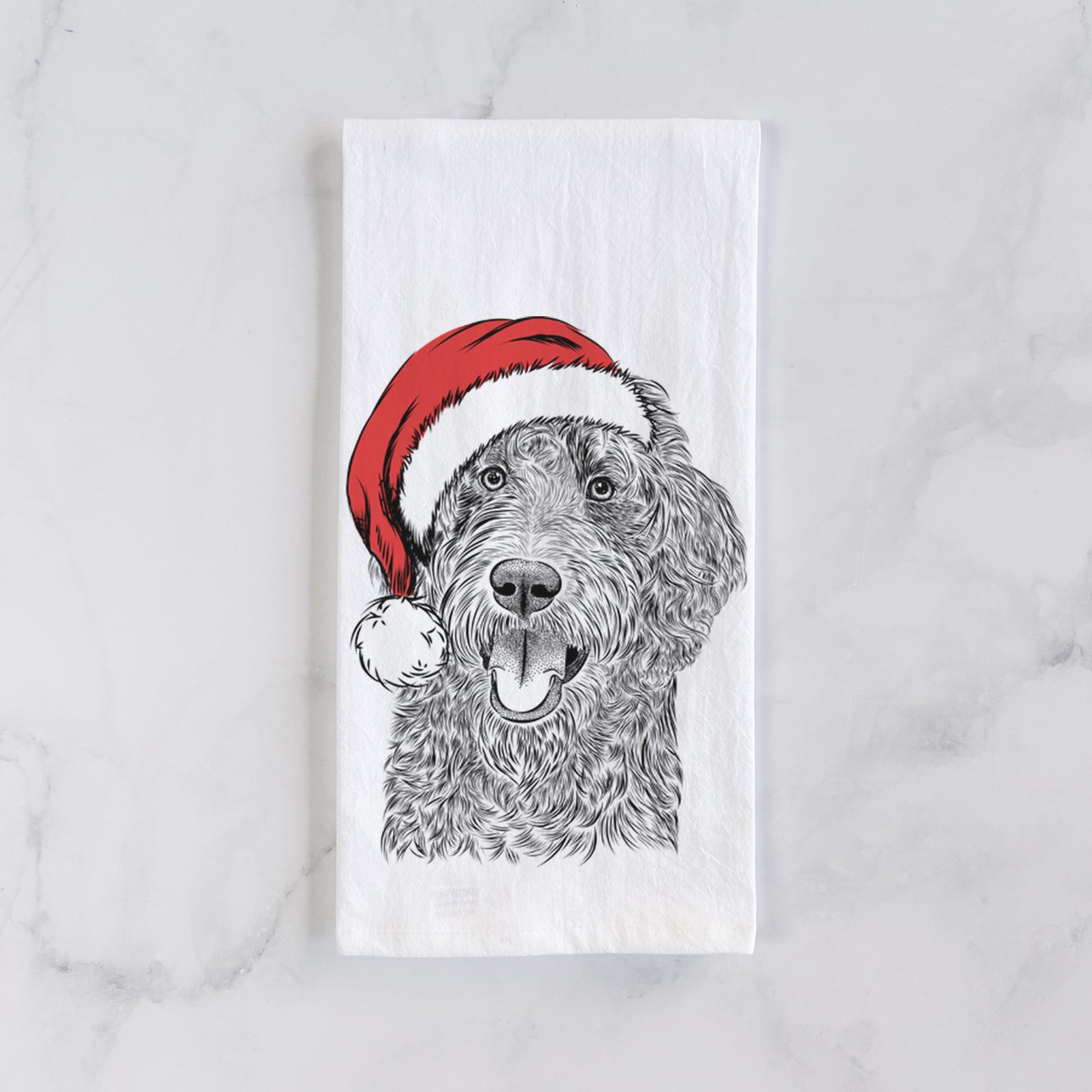 Hand-drawn sketch of Murr Dog the Labradoodle wearing a Santa hat on a tea towel