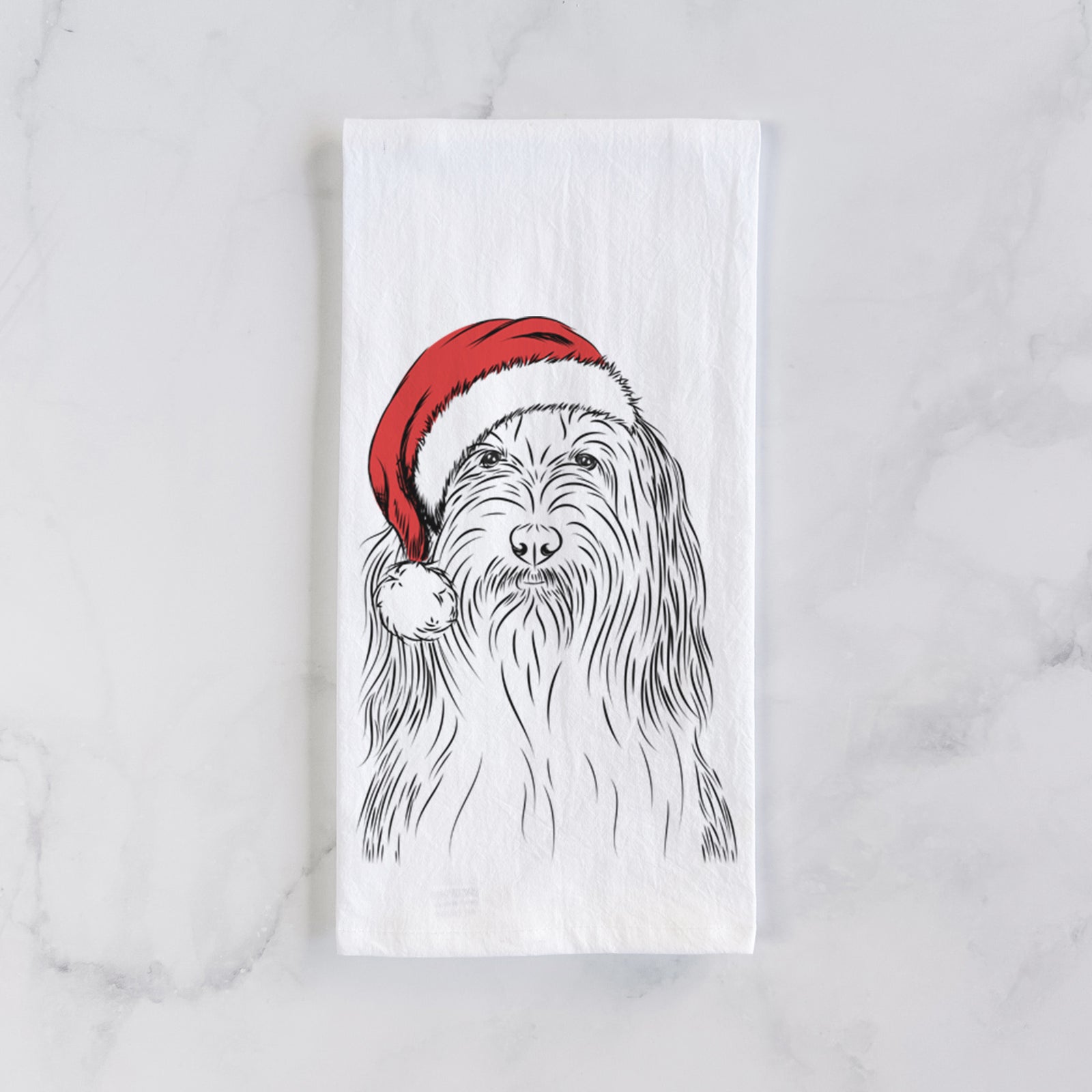 Hand-drawn sketch of Murray the Bearded Collie wearing a Santa hat on a tea towel