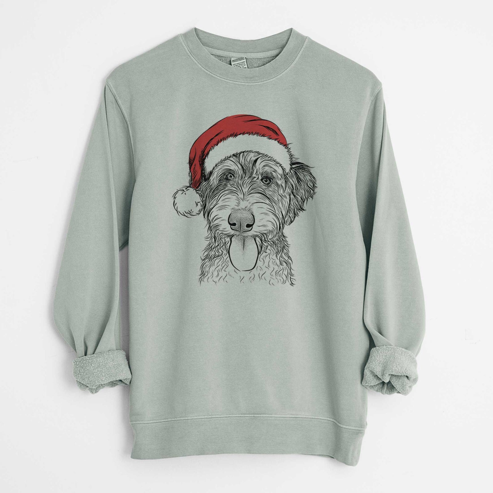 Hand-drawn sketch of Myrtle Mae the Aussiedoodle wearing a Santa hat on a Sage Unisex pigment dyed crew sweatshirt