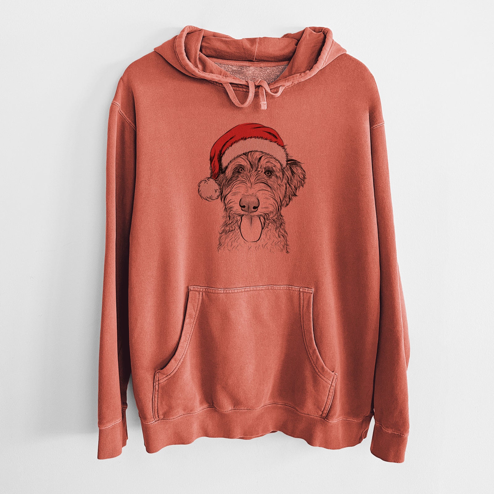Hand-drawn sketch of Myrtle Mae the Aussiedoodle wearing a Santa hat on an Amber Unisex pigment dyed hoodie