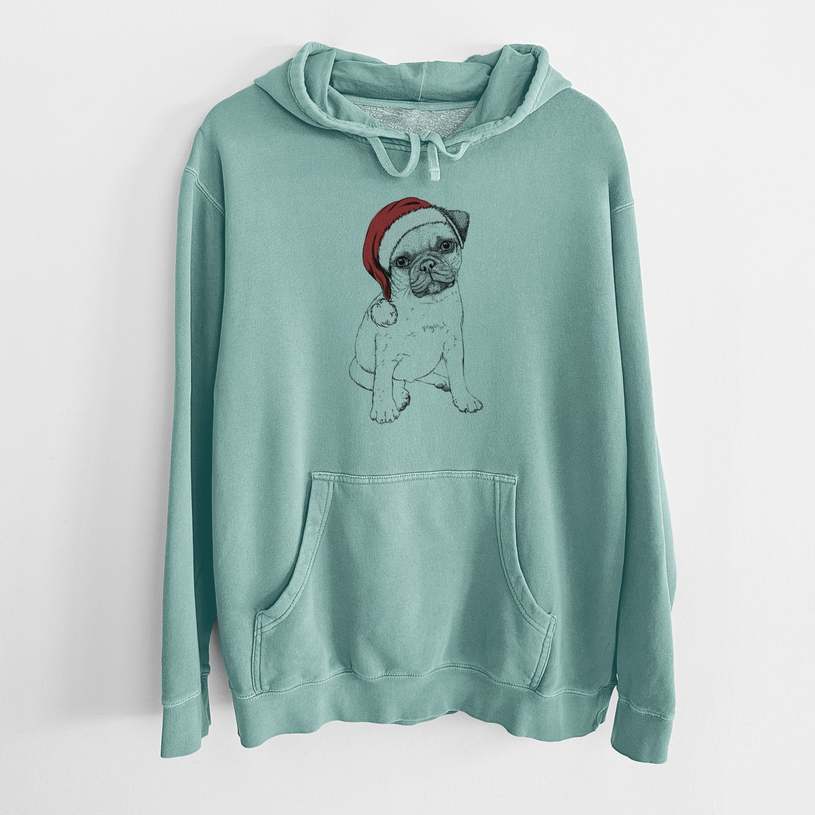 Hand-drawn sketch of Nelson the Pug Puppy wearing a Santa hat on a Mint Unisex pigment dyed hoodie