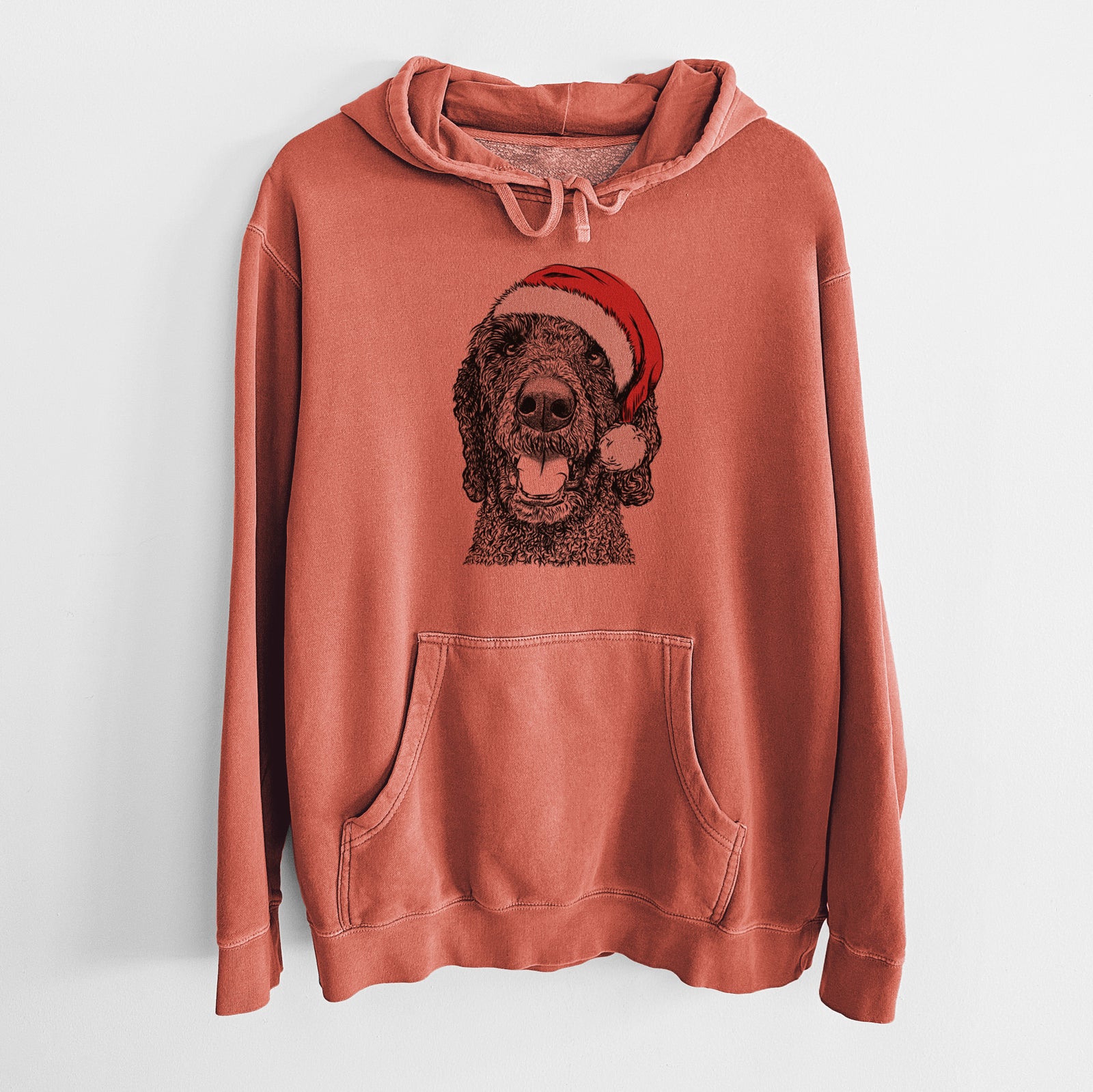 Hand-drawn sketch of Obi James the Goldendoodle wearing a Santa hat on an Amber Unisex pigment dyed hoodie