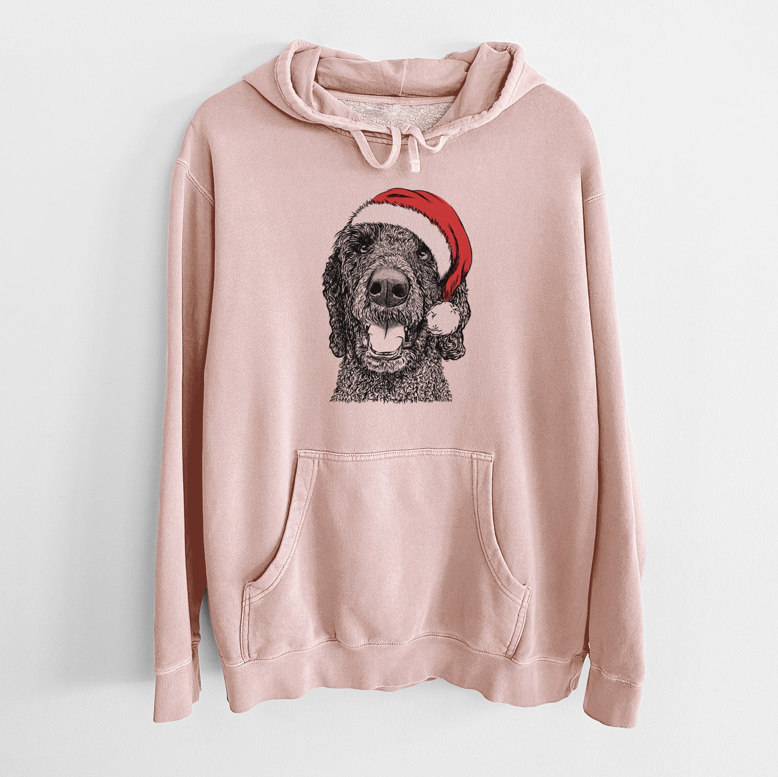 Hand-drawn sketch of Obi James the Goldendoodle wearing a Santa hat on a Dusty Pink Unisex pigment dyed hoodie
