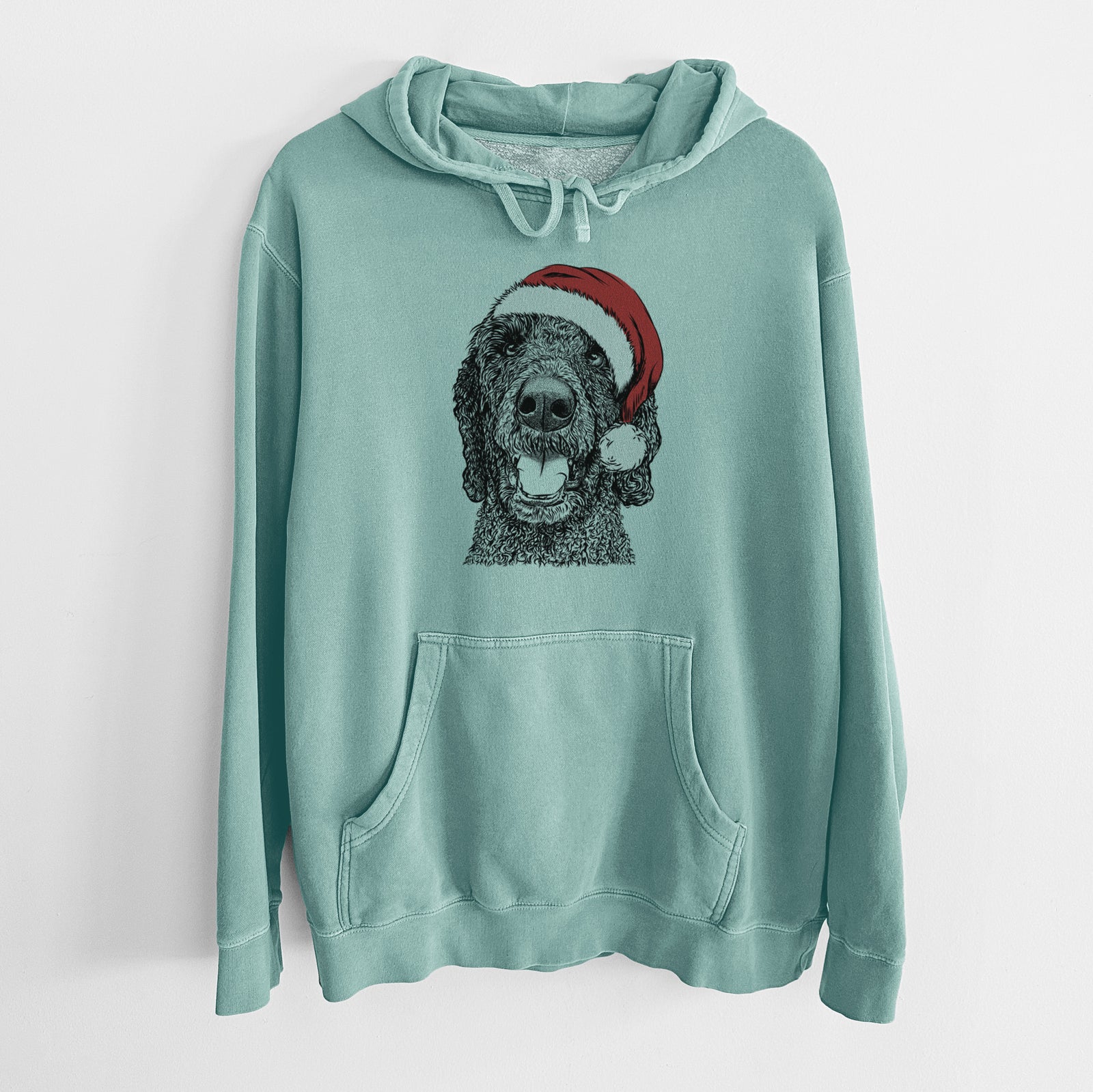 Hand-drawn sketch of Obi James the Goldendoodle wearing a Santa hat on a Mint Unisex pigment dyed hoodie