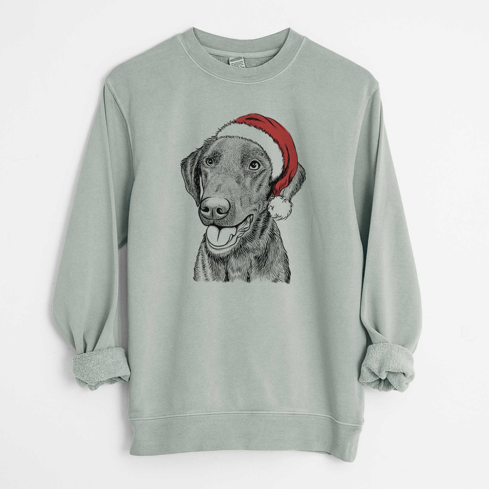 Hand-drawn sketch of Onyx the Labrador Retriever wearing a Santa hat on a Sage Unisex pigment dyed crew sweatshirt