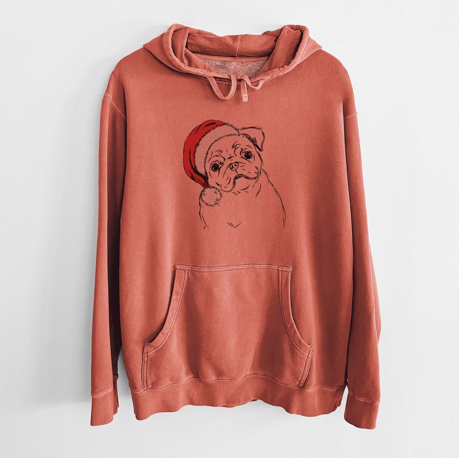 Hand-drawn sketch of Otis the Pug wearing a Santa hat on an Amber Unisex pigment dyed hoodie