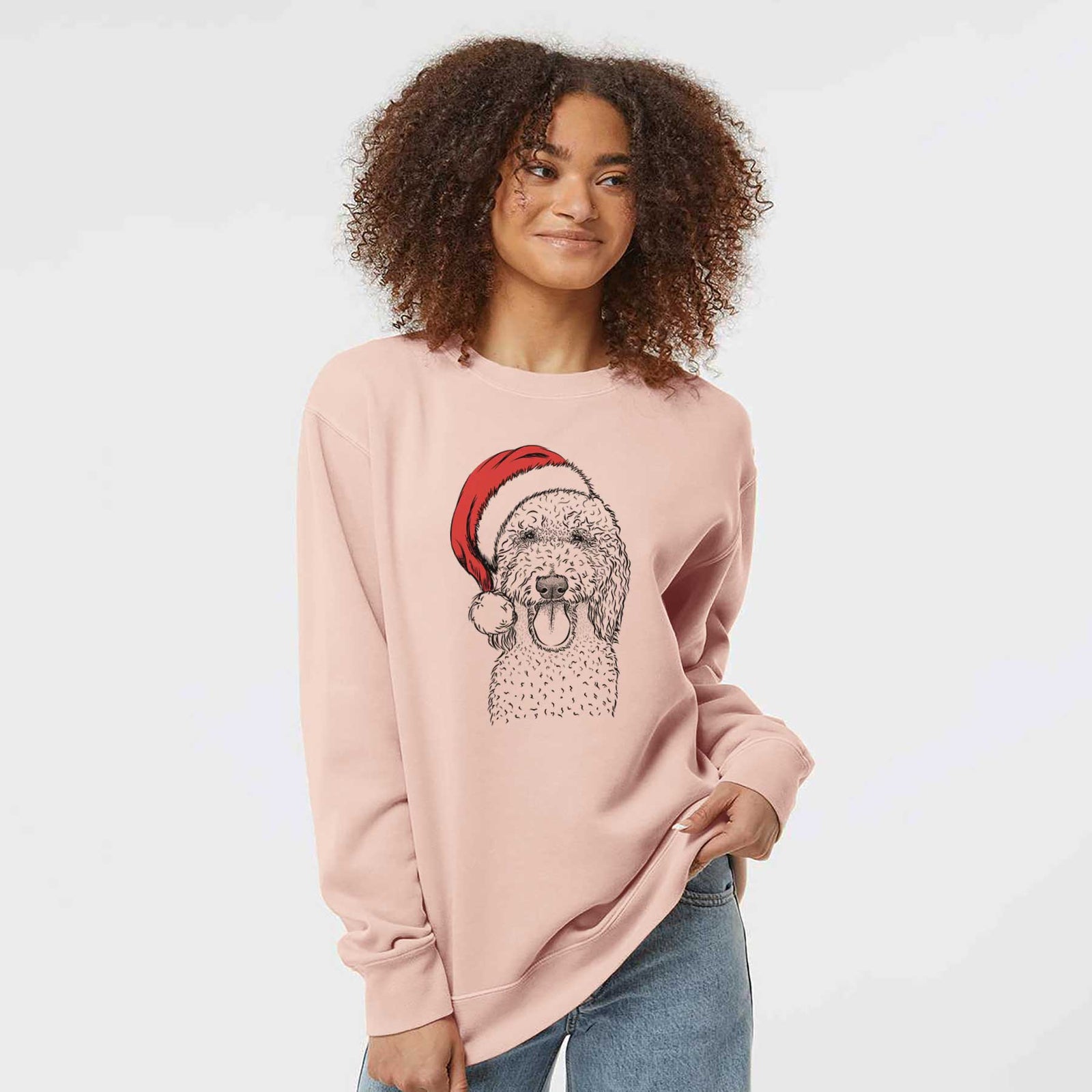 Hand-drawn sketch of Pavlov the Goldendoodle wearing a Santa hat on a Dusty Pink Unisex pigment dyed crew sweatshirt