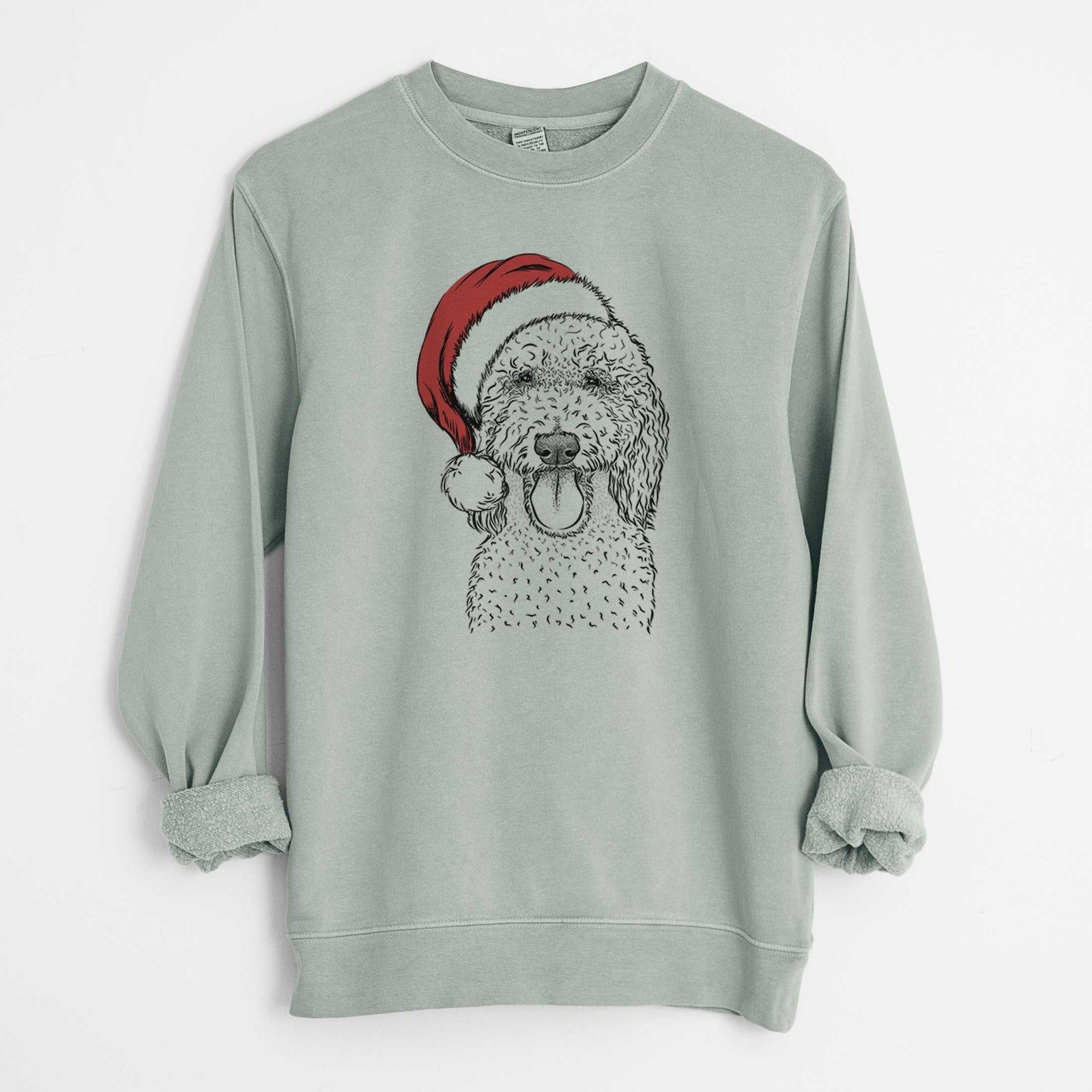 Hand-drawn sketch of Pavlov the Goldendoodle wearing a Santa hat on a Sage Unisex pigment dyed crew sweatshirt