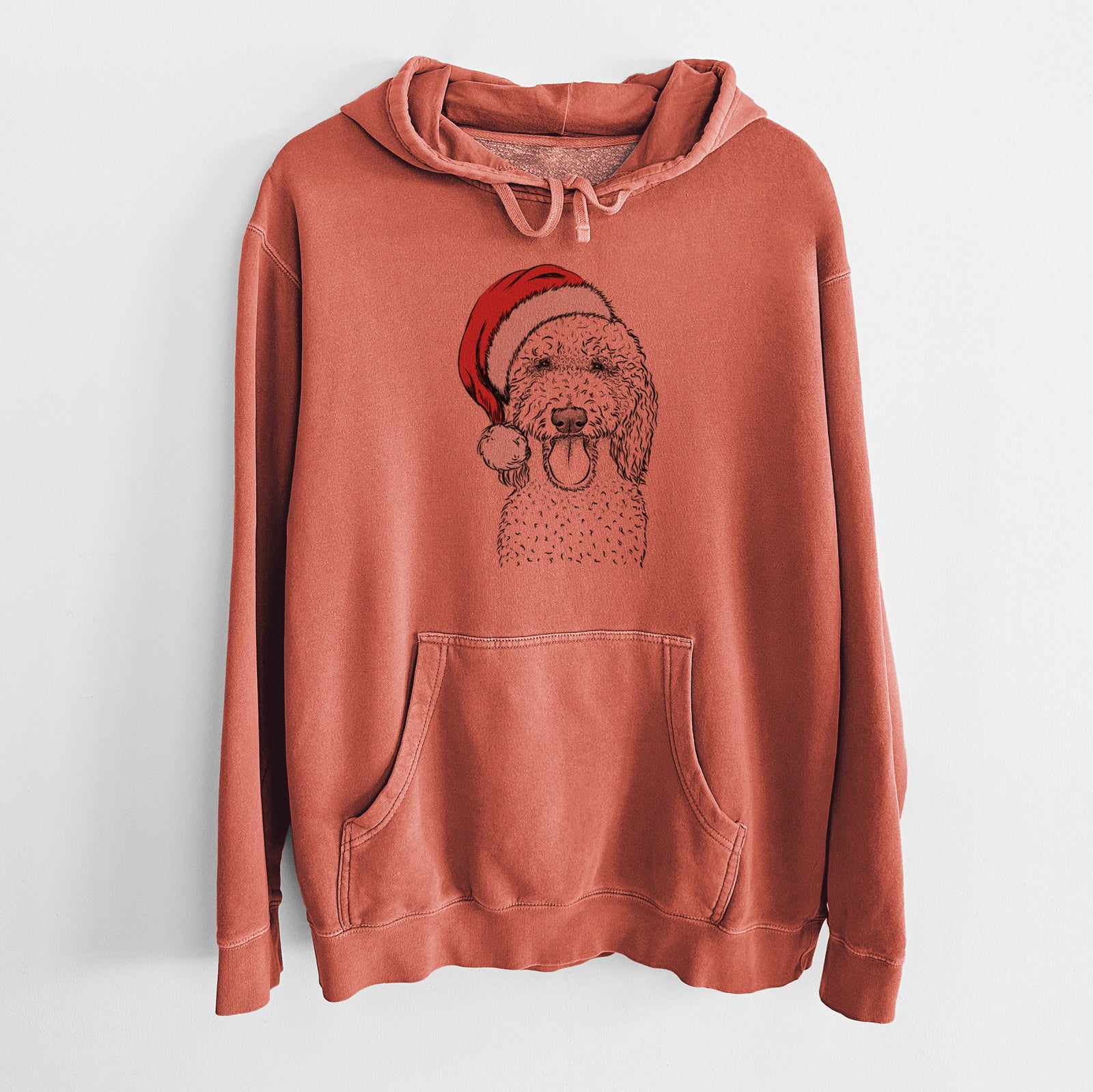 Hand-drawn sketch of Pavlov the Goldendoodle wearing a Santa hat on an Amber Unisex pigment dyed hoodie