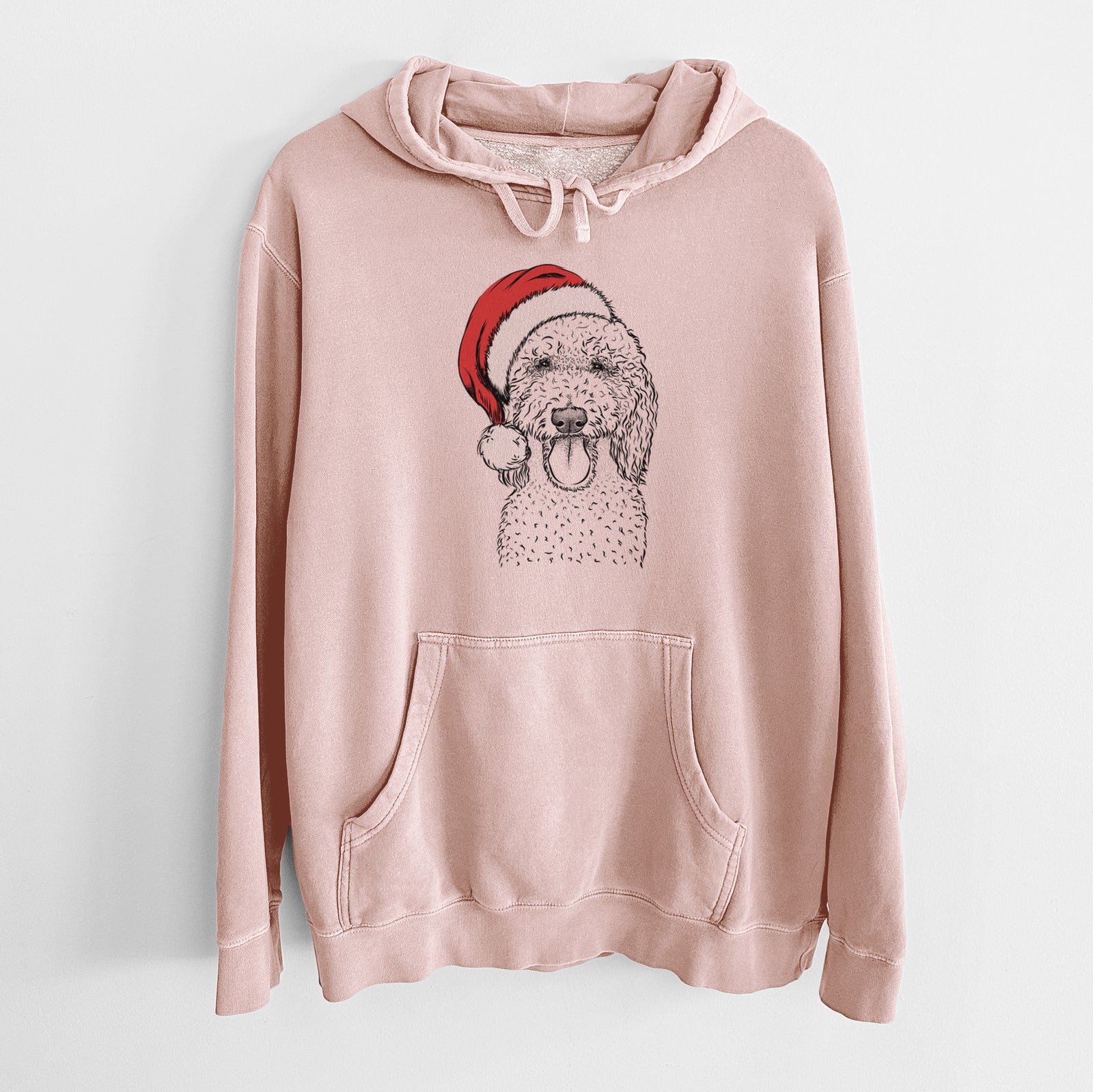 Hand-drawn sketch of Pavlov the Goldendoodle wearing a Santa hat on a Dusty Pink Unisex pigment dyed hoodie