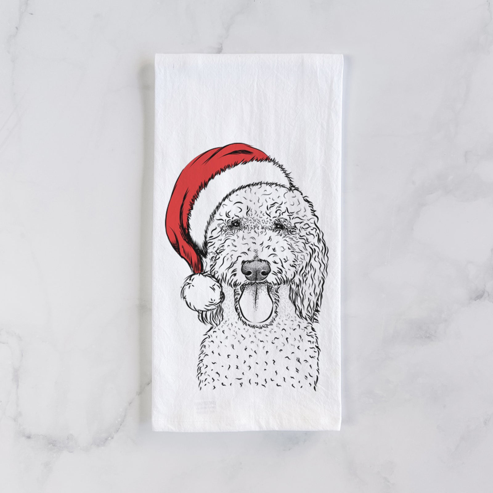 Hand-drawn sketch of Pavlov the Goldendoodle wearing a Santa hat on a tea towel