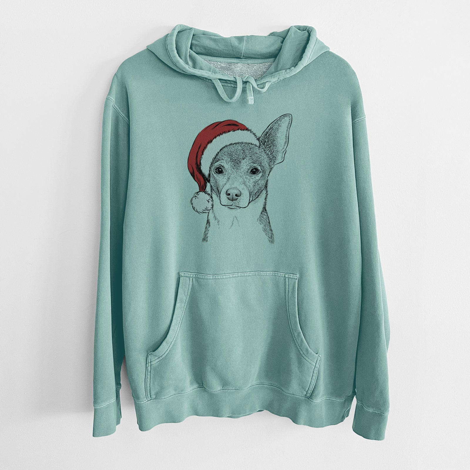 Hand-drawn sketch of Peanut the Chihuahua wearing a Santa hat on a Mint Unisex pigment dyed hoodie
