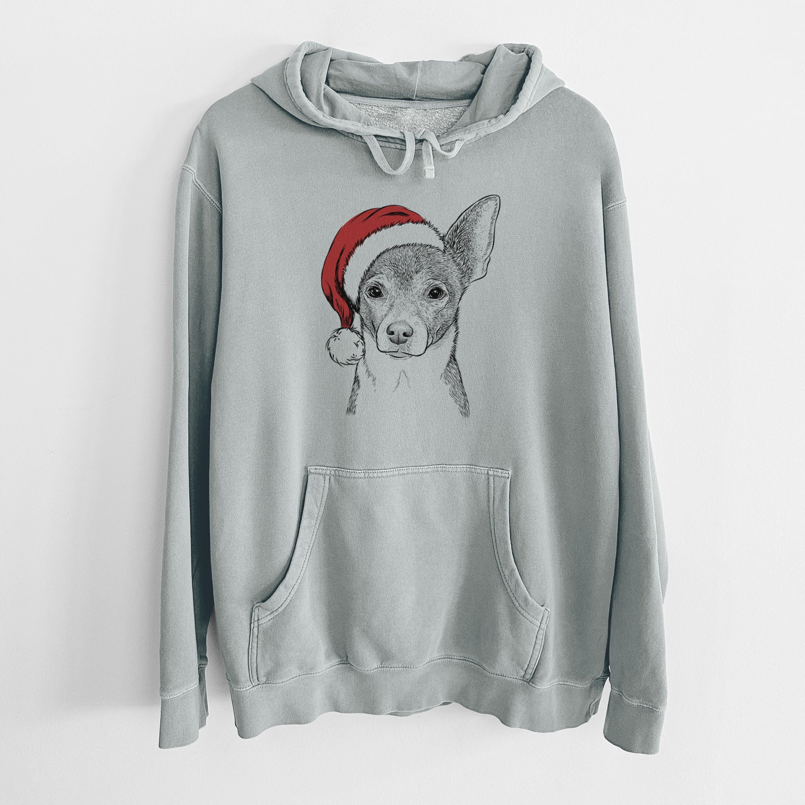 Hand-drawn sketch of Peanut the Chihuahua wearing a Santa hat on a Sage Unisex pigment dyed hoodie