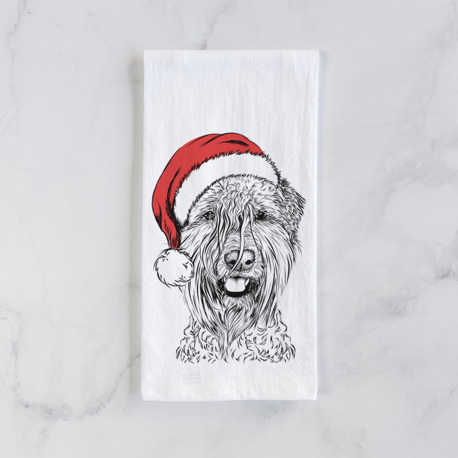 Hand-drawn sketch of Pierre the Soft Coated Wheaten Terrier wearing a Santa hat on a tea towel