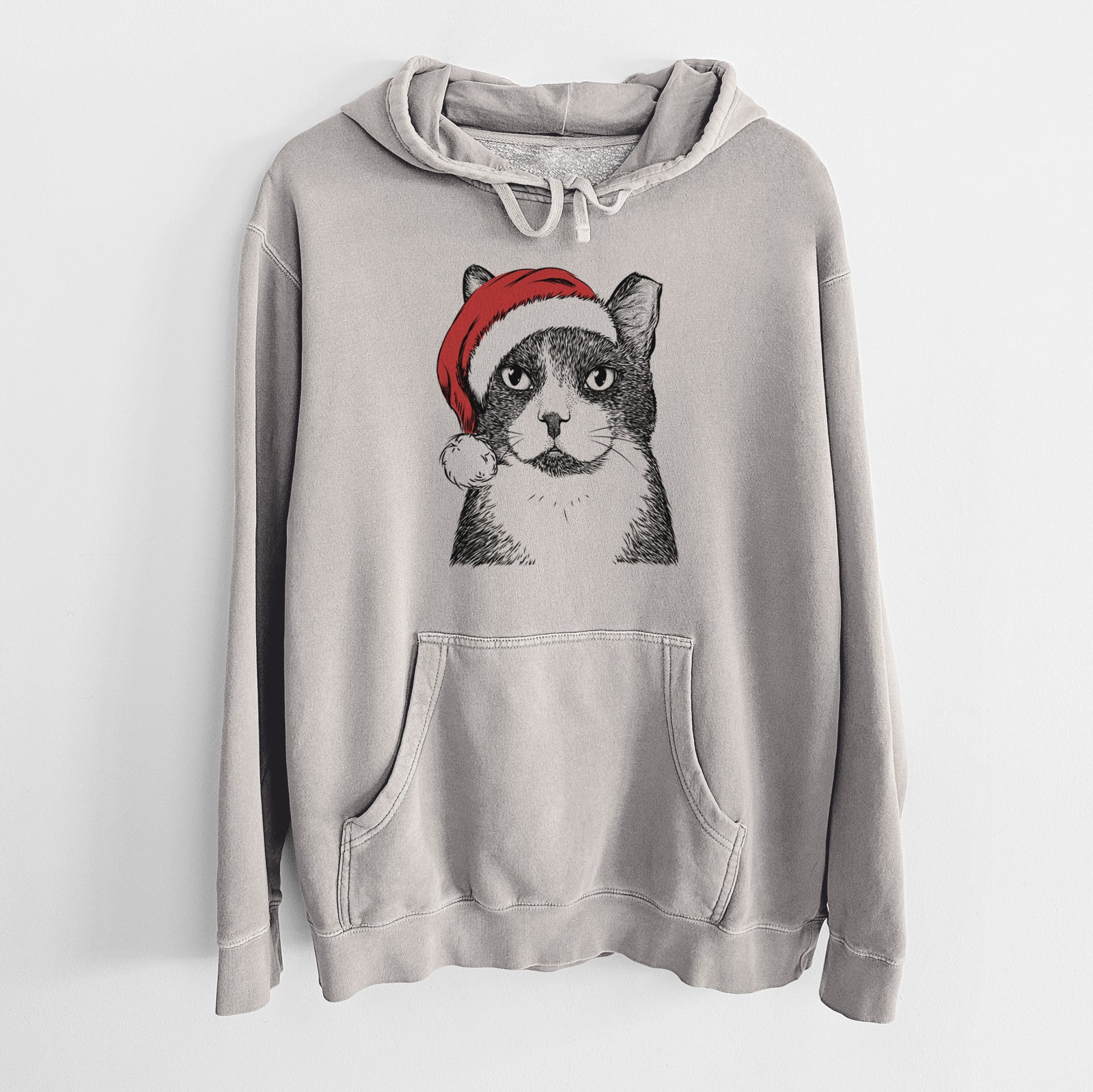 Hand-drawn sketch of Pinky the Tuxedo Cat wearing a Santa hat on a Cement Unisex pigment dyed hoodie