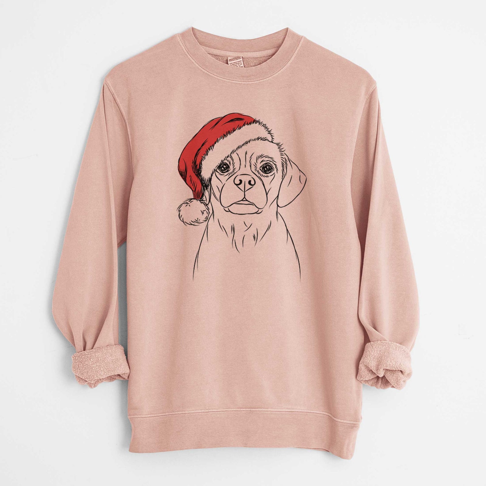 Hand-drawn sketch of Popcorn the Puggle wearing a Santa hat on a Dusty Pink Unisex pigment dyed crew sweatshirt