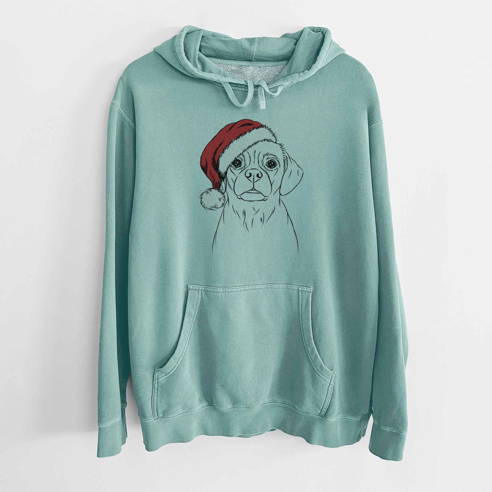 Hand-drawn sketch of Popcorn the Puggle wearing a Santa hat on a Mint Unisex pigment dyed hoodie
