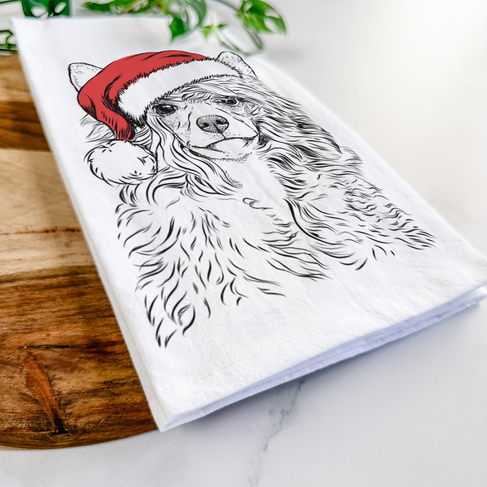 Hand-drawn sketch of Preston the Powderpuff Chinese Crested wearing a Santa hat on a tea towel