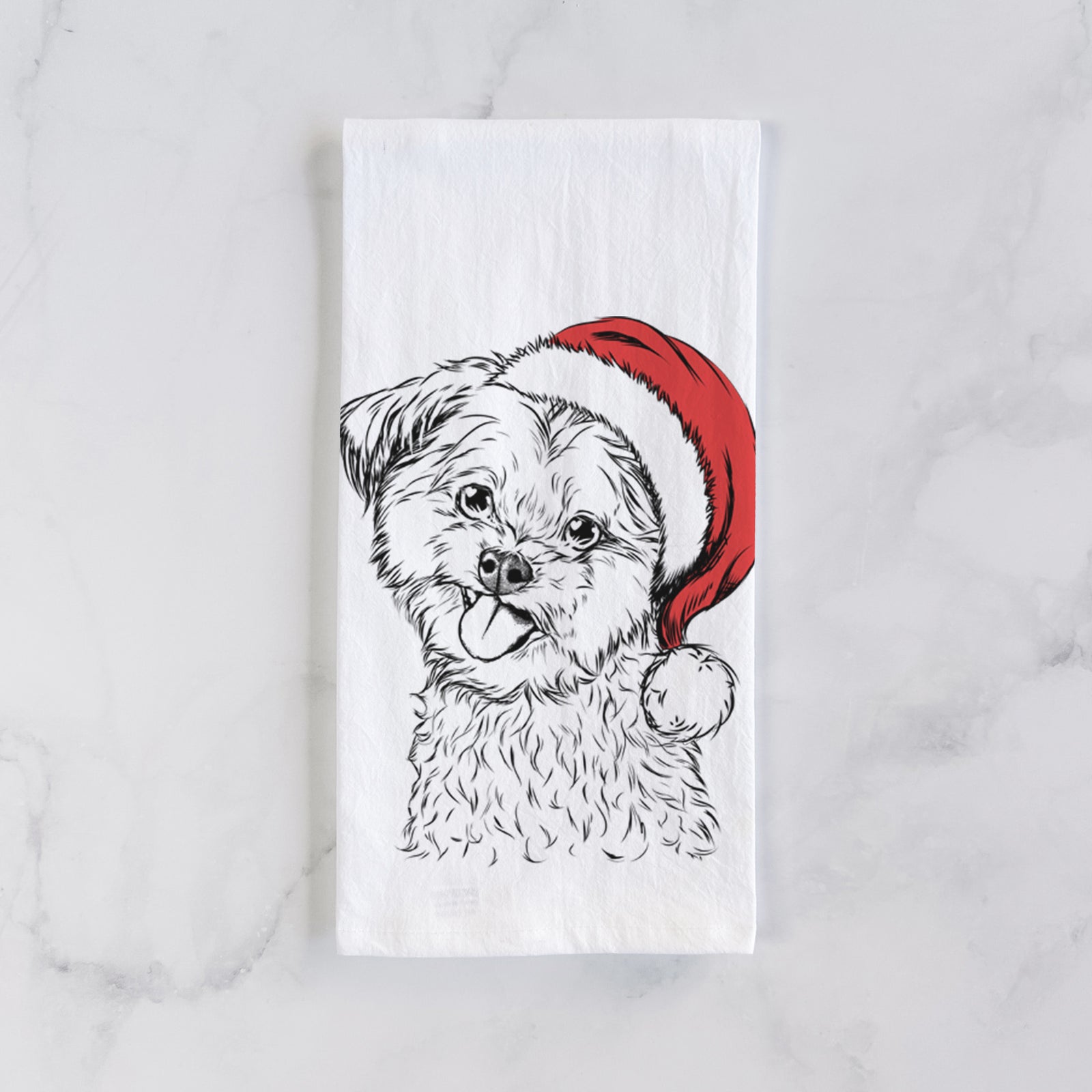 Hand-drawn sketch of Puff the Malshi wearing a Santa hat on a tea towel